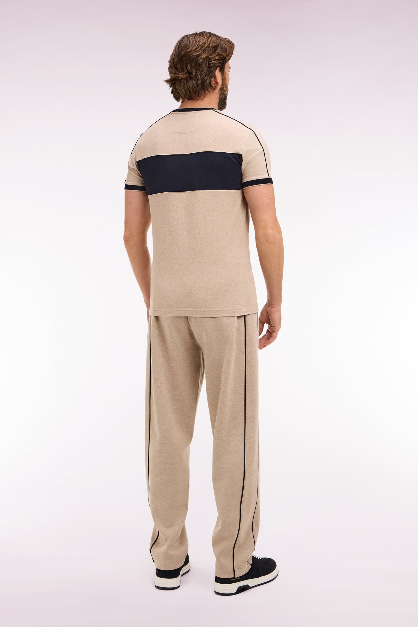 Jogging en coton mélangé beige coupe regular