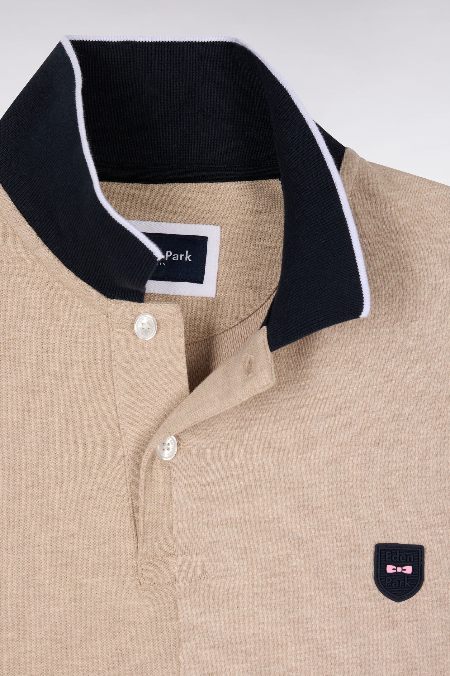 Polo manches courtes bicolore en coton beige à découpes coupe regular