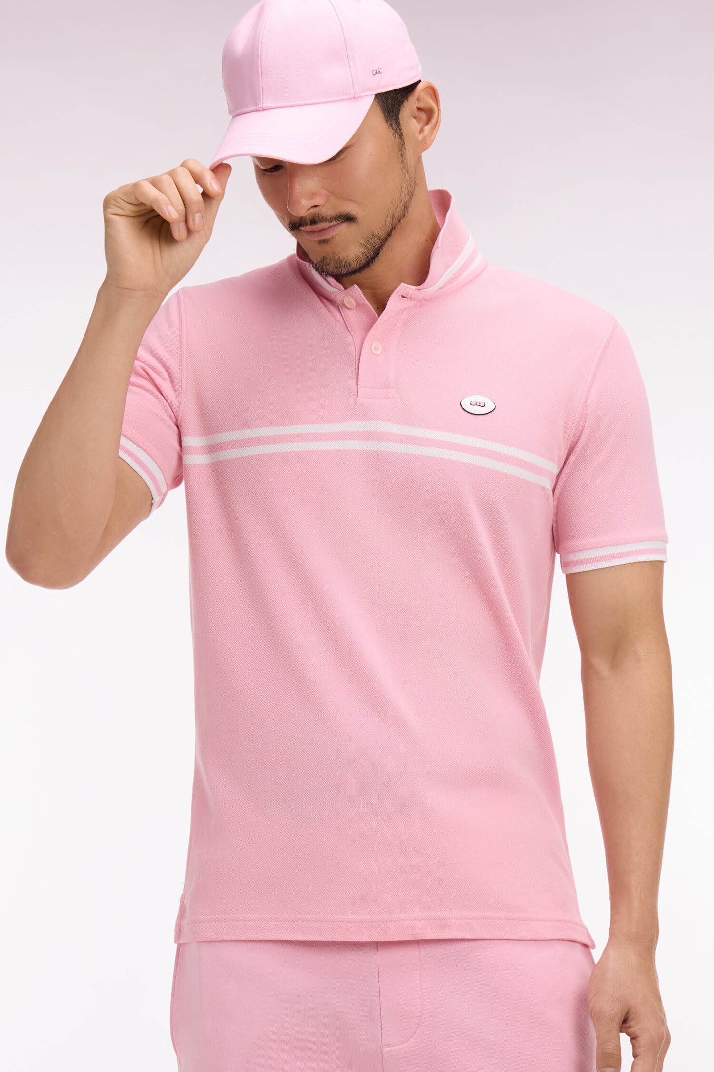 Short-sleeved pink cotton polo shirt with white stripes, regular fit