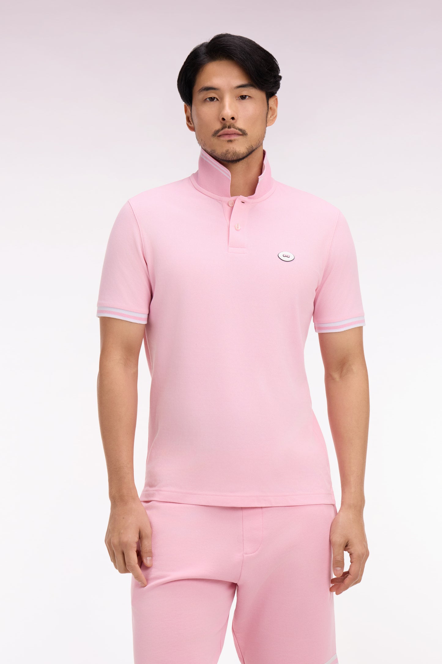 Short-sleeved pink cotton polo shirt