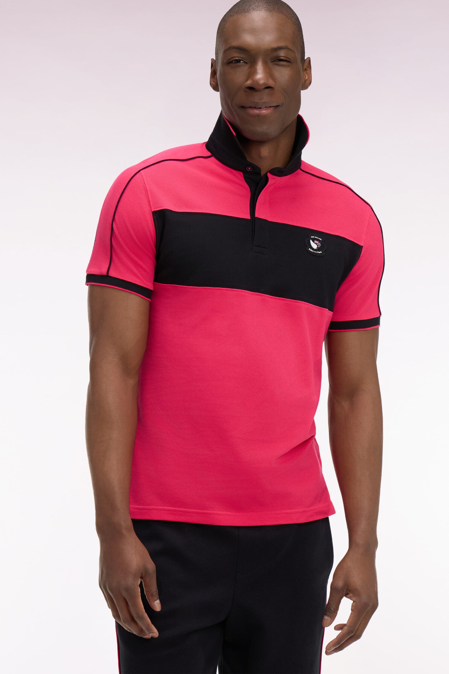 Polo à manches courtes en coton fuchsia et noir New Zealand coupe regular