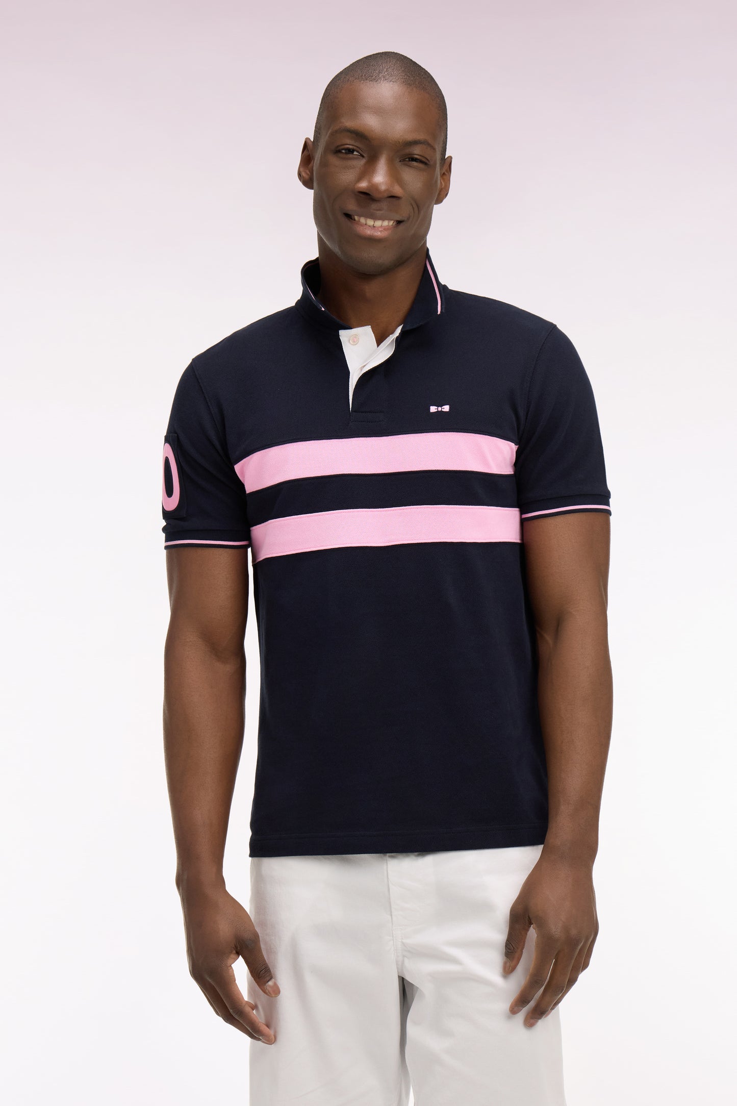 Polo à manches courtes en piqué coton marine à rayures coupé cousu