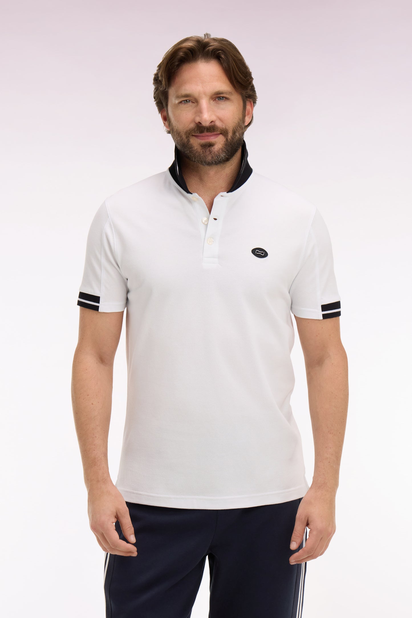 Short-sleeved polo shirt in white cotton pique with navy details