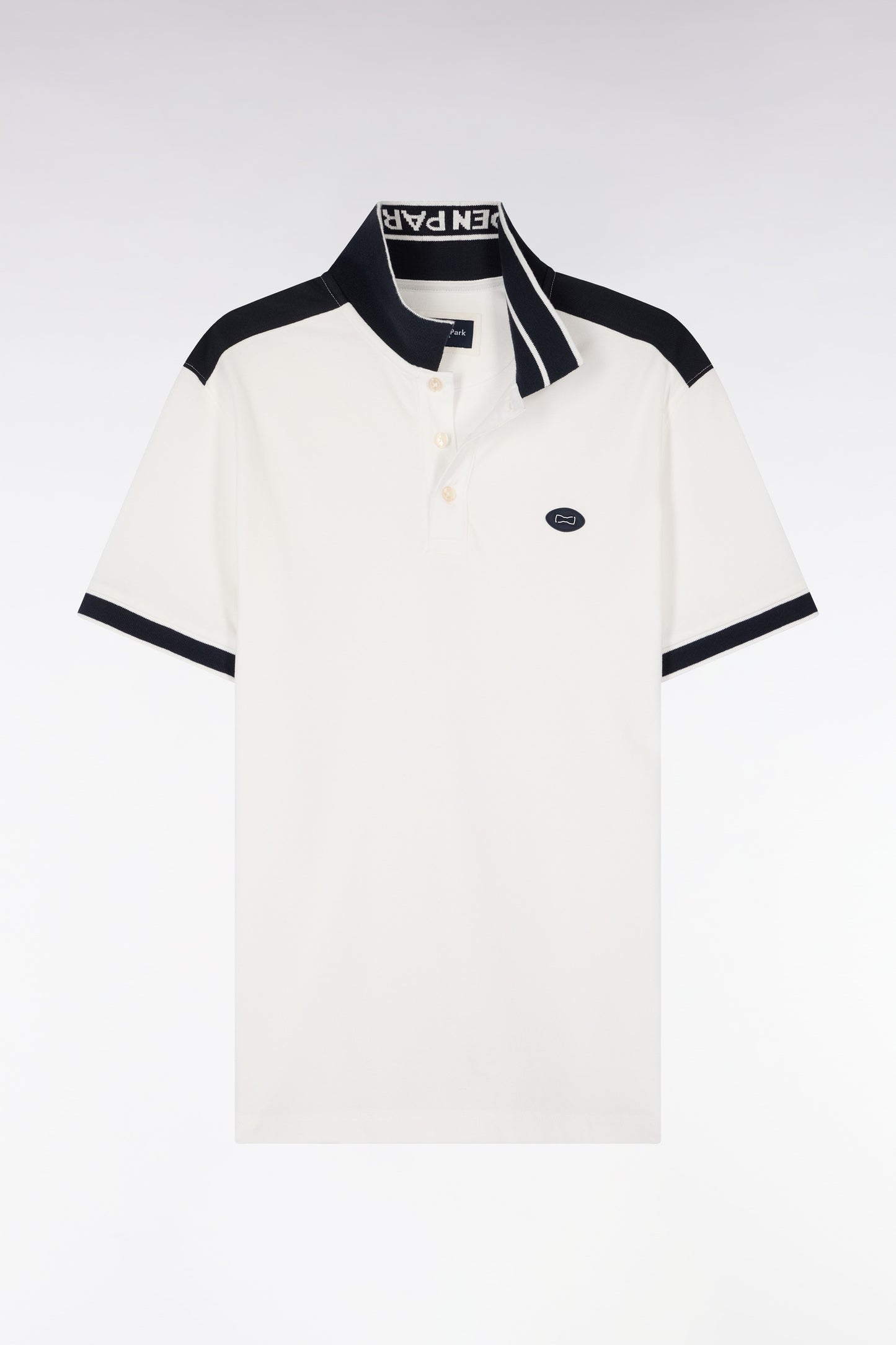 Short-sleeved polo shirt in ecru cotton pique with navy cutouts