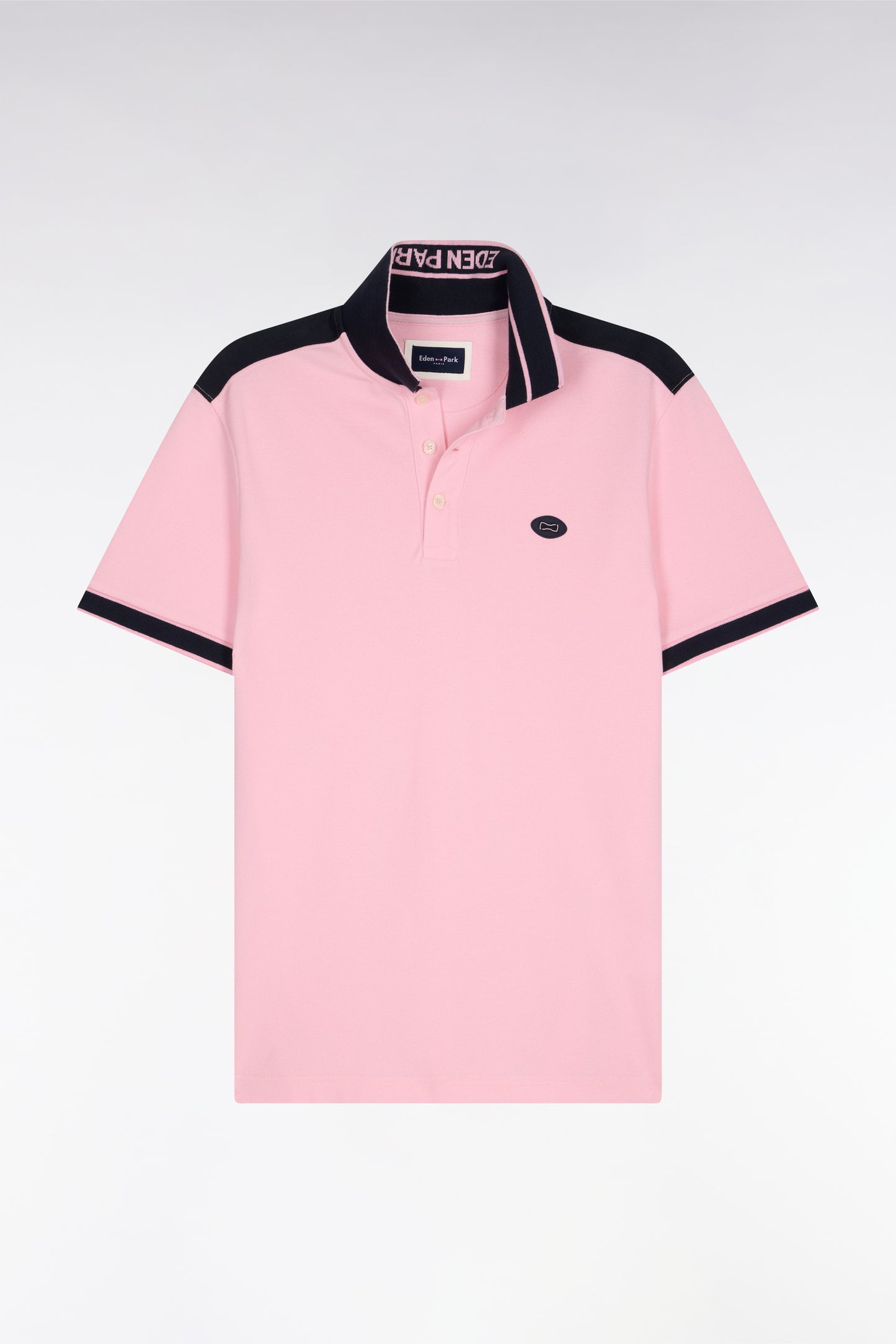 Short-sleeved polo shirt in pink cotton pique with navy cutouts