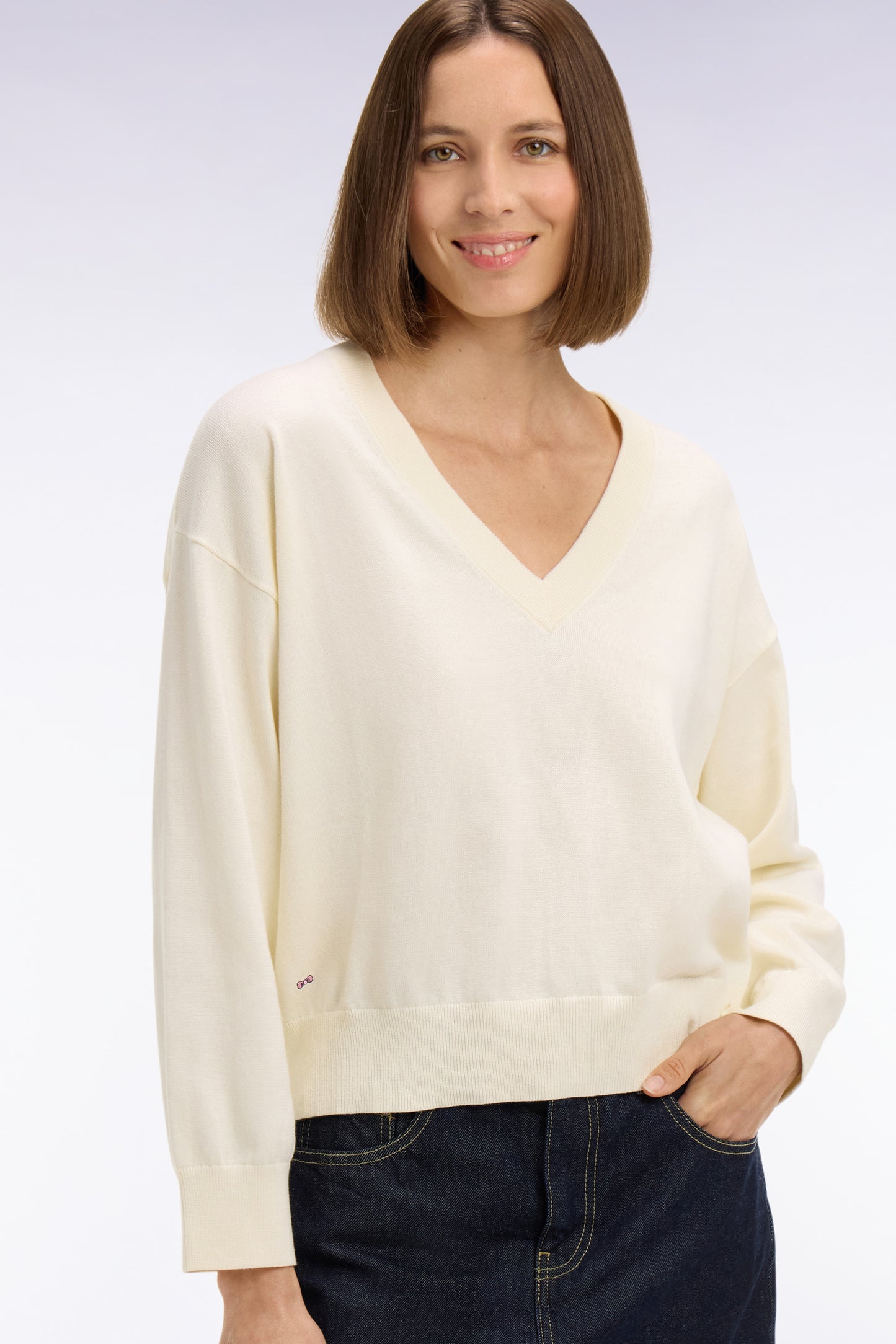 Pull-over à col V en coton écru coupe oversized
