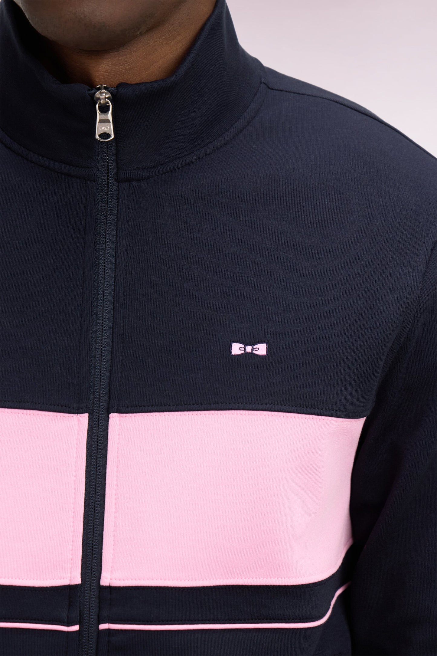 Zipped navy fleece sweatshirt with pink stripe