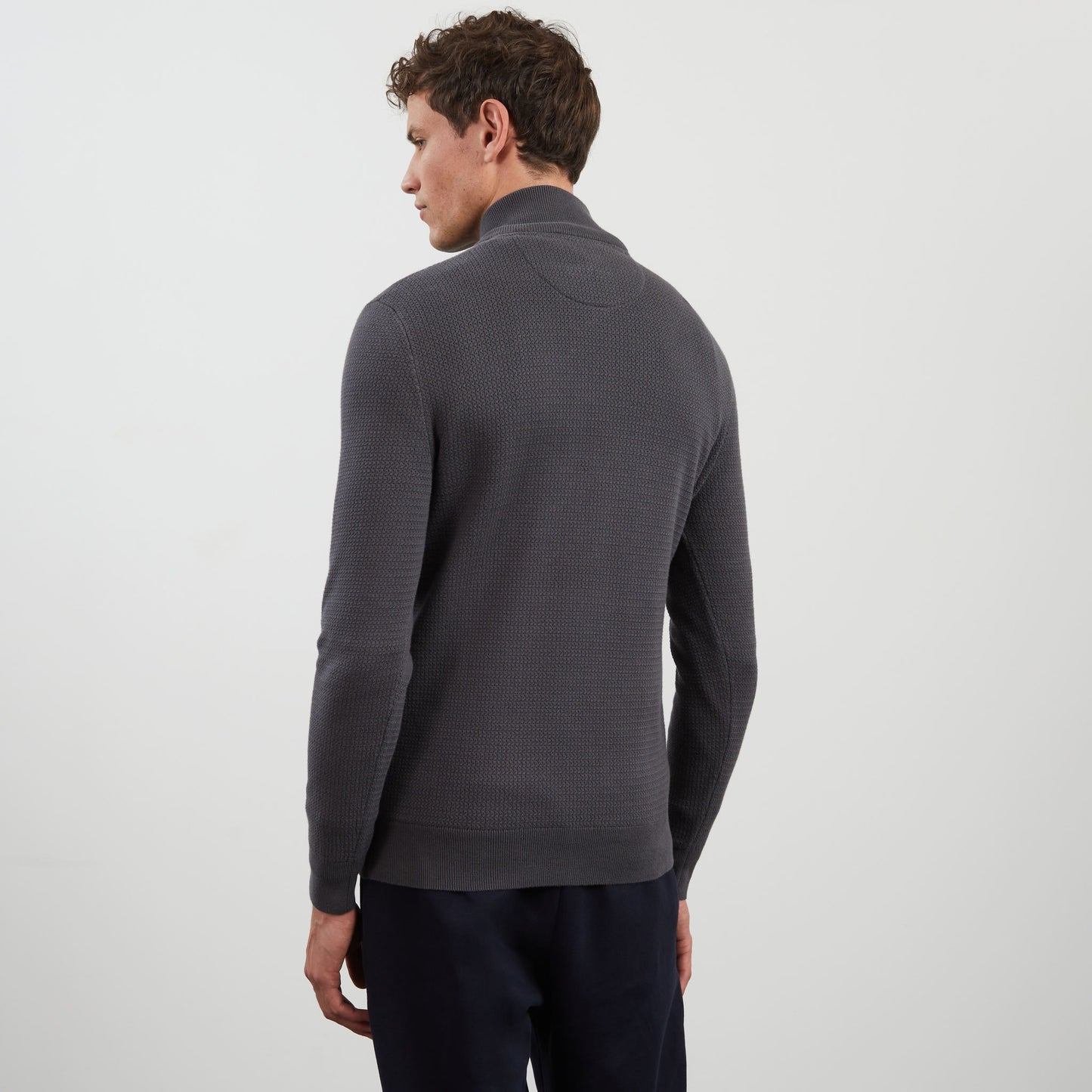 Dark grey zip-neck jumper in decorative cable knit