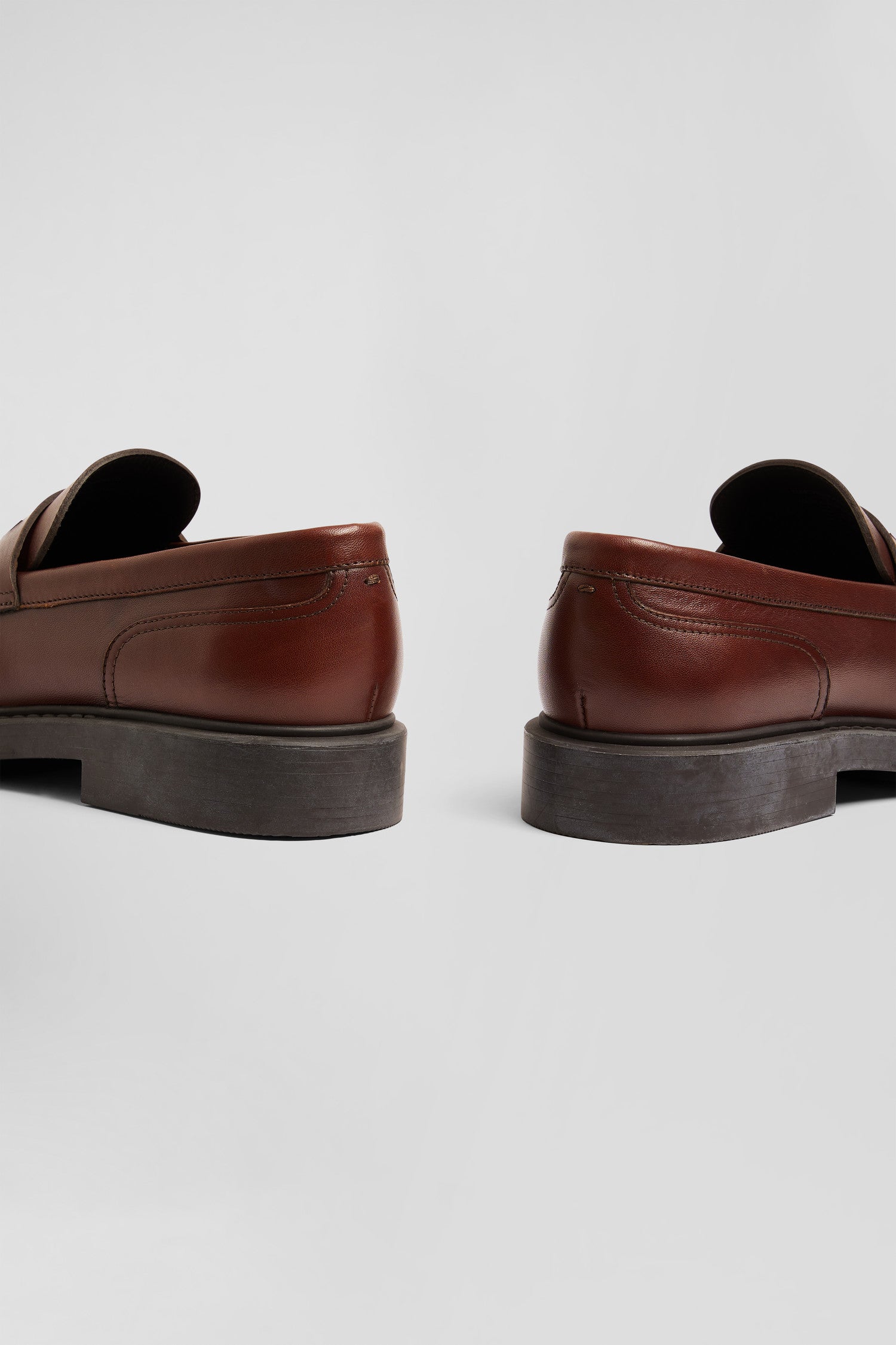 Brown polished leather loafers