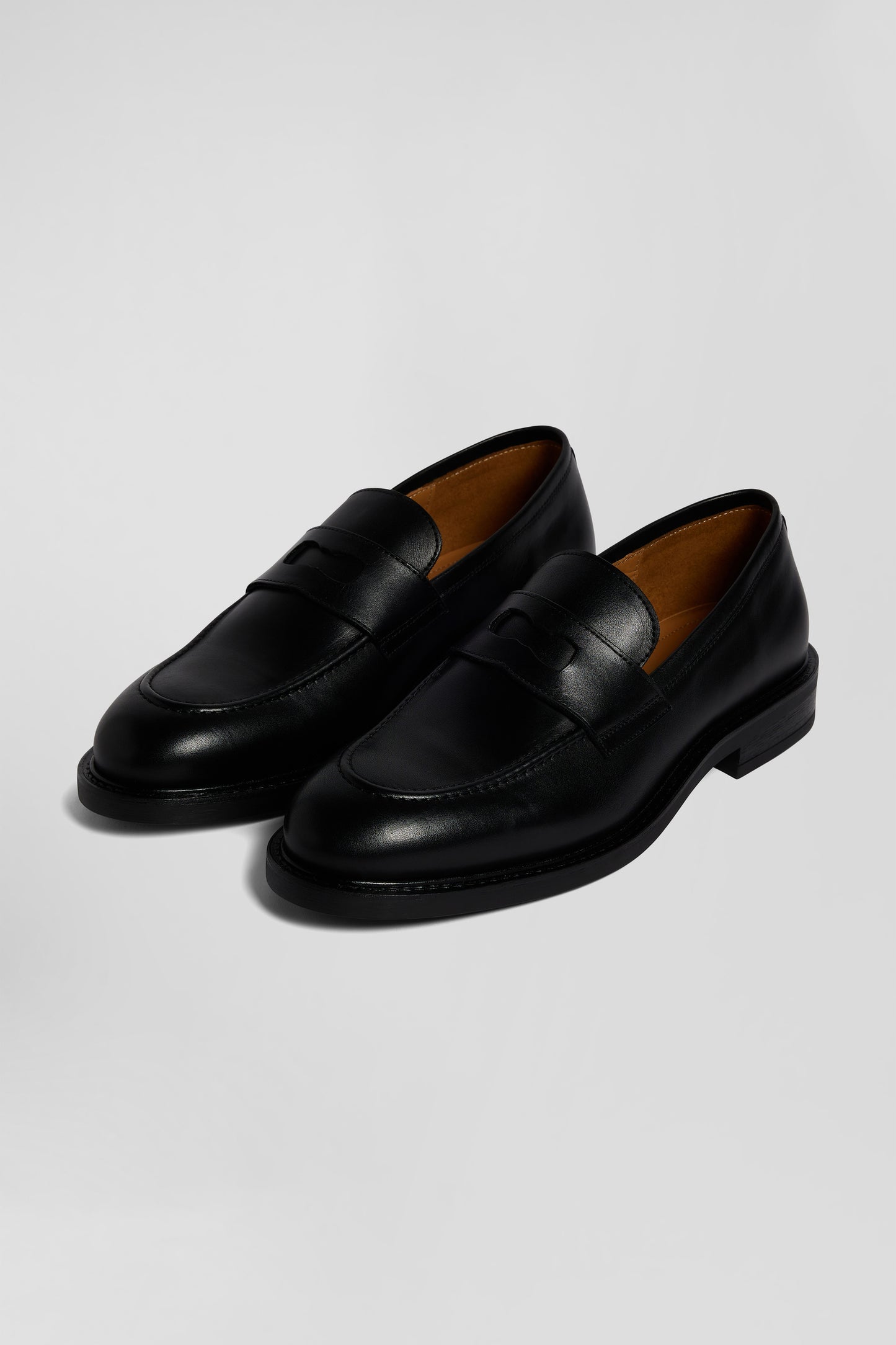 Black leather loafers