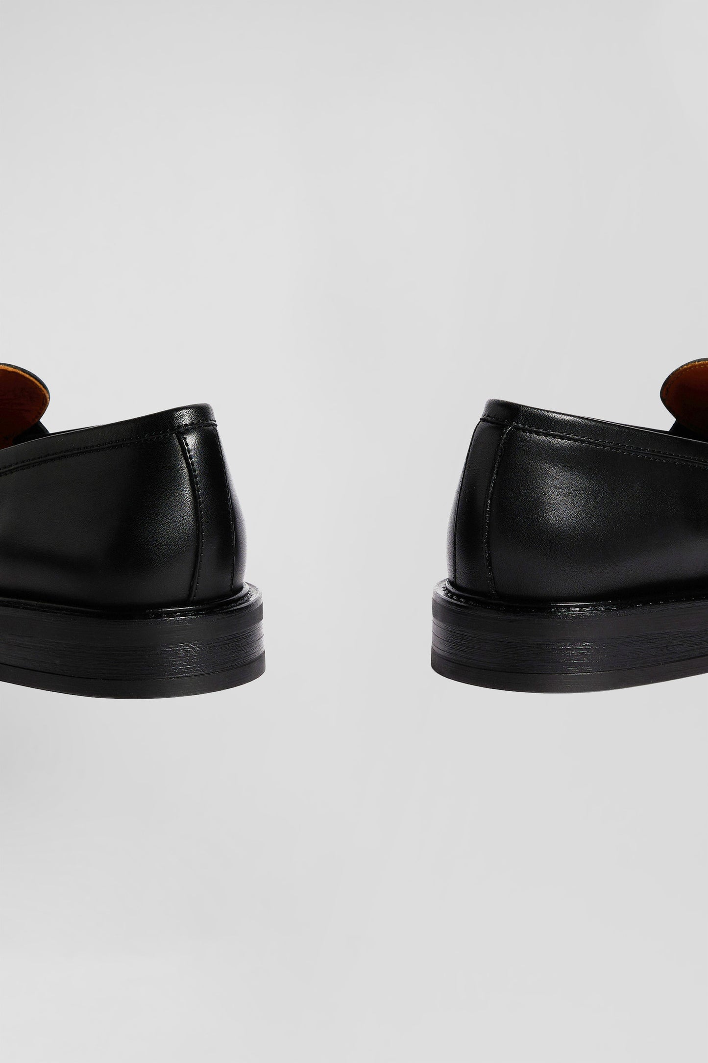 Black leather loafers