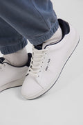 White low-top leather sneakers