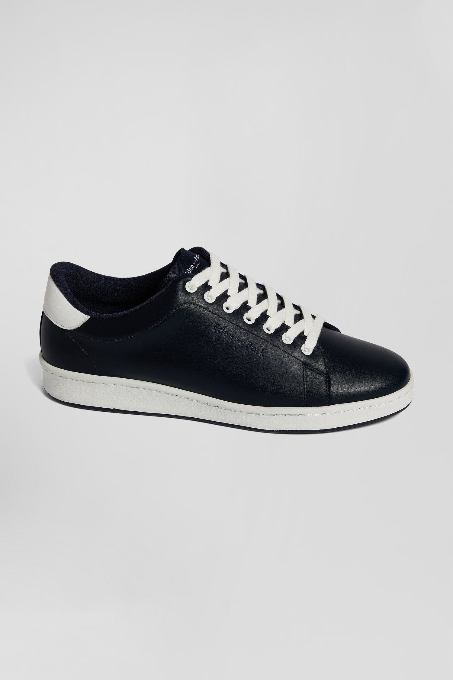 Navy blue low-top leather sneakers