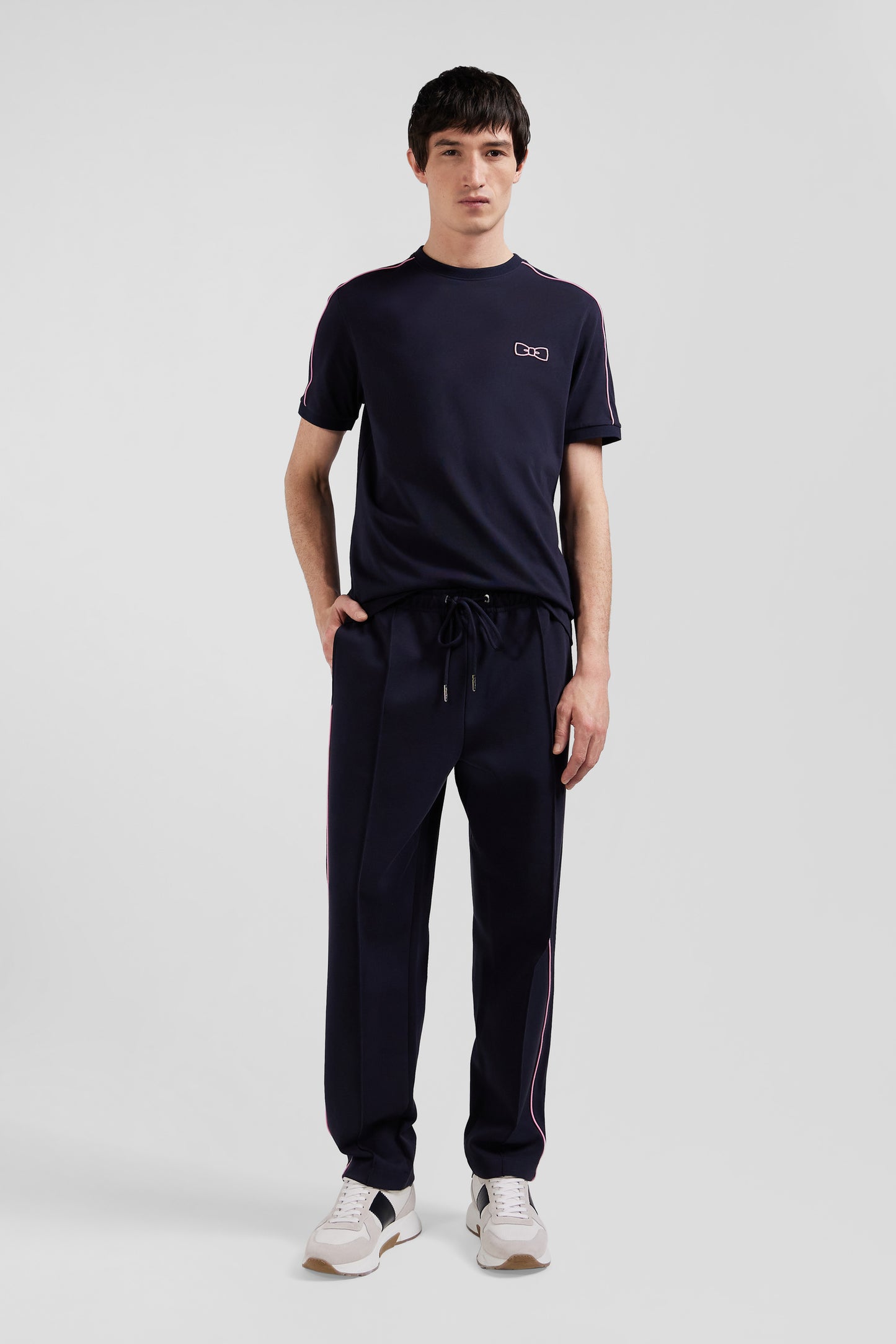 Regular navy blue mixed cotton jogging bottoms with pink piping