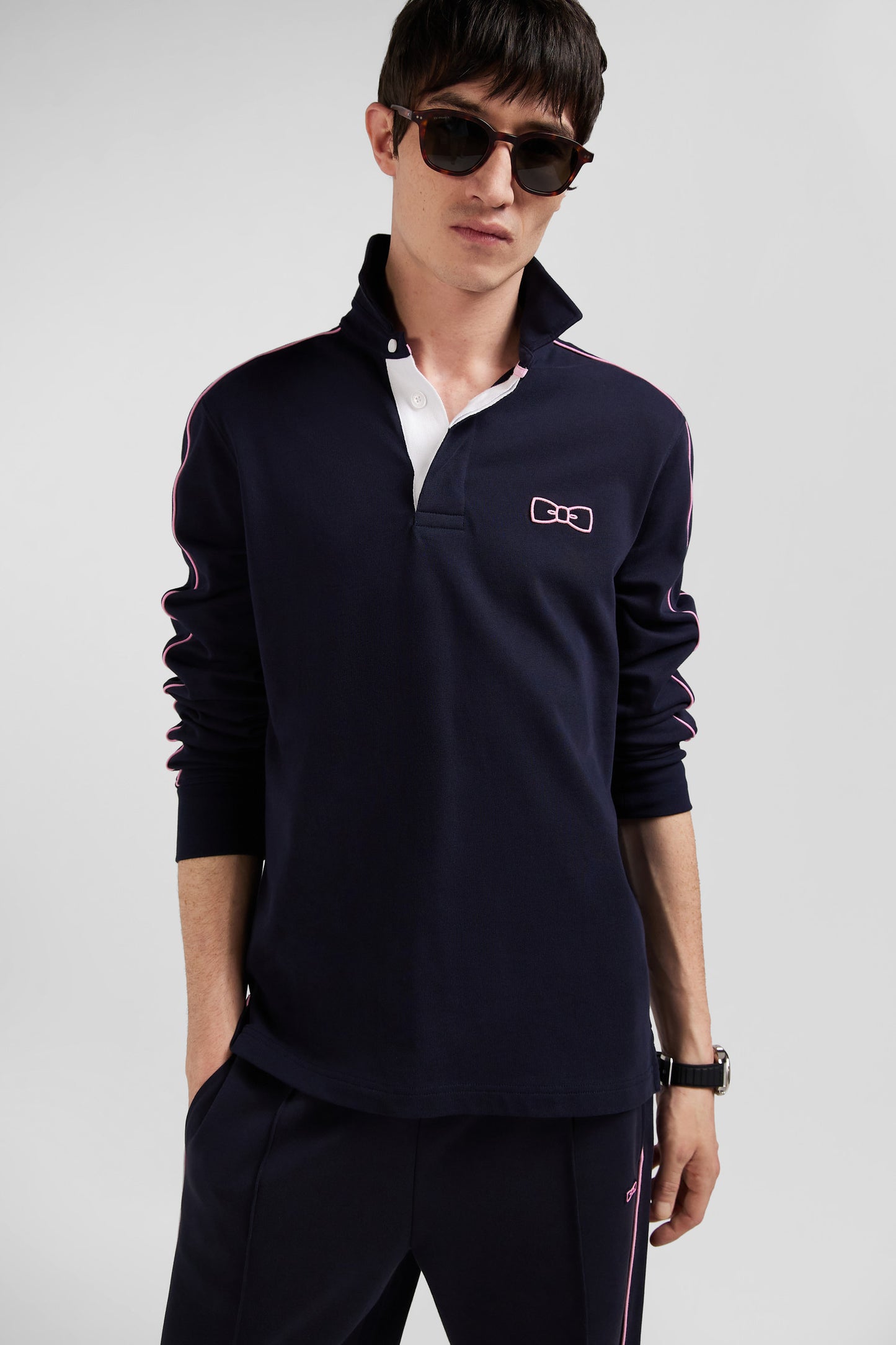 Regular navy blue long-sleeved cotton rugby shirt with pink piping