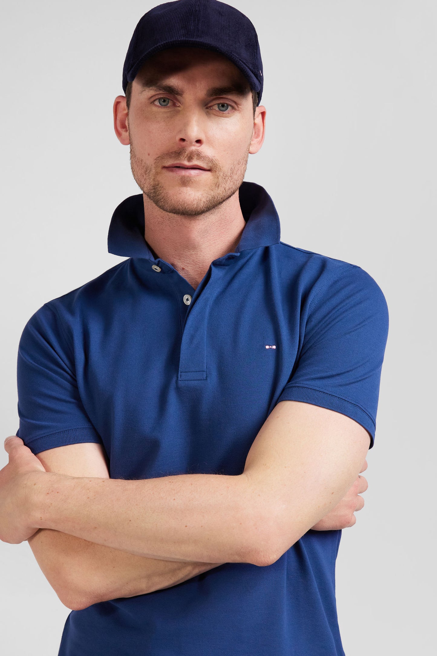 Slim dark blue short-sleeved stretch cotton polo shirt