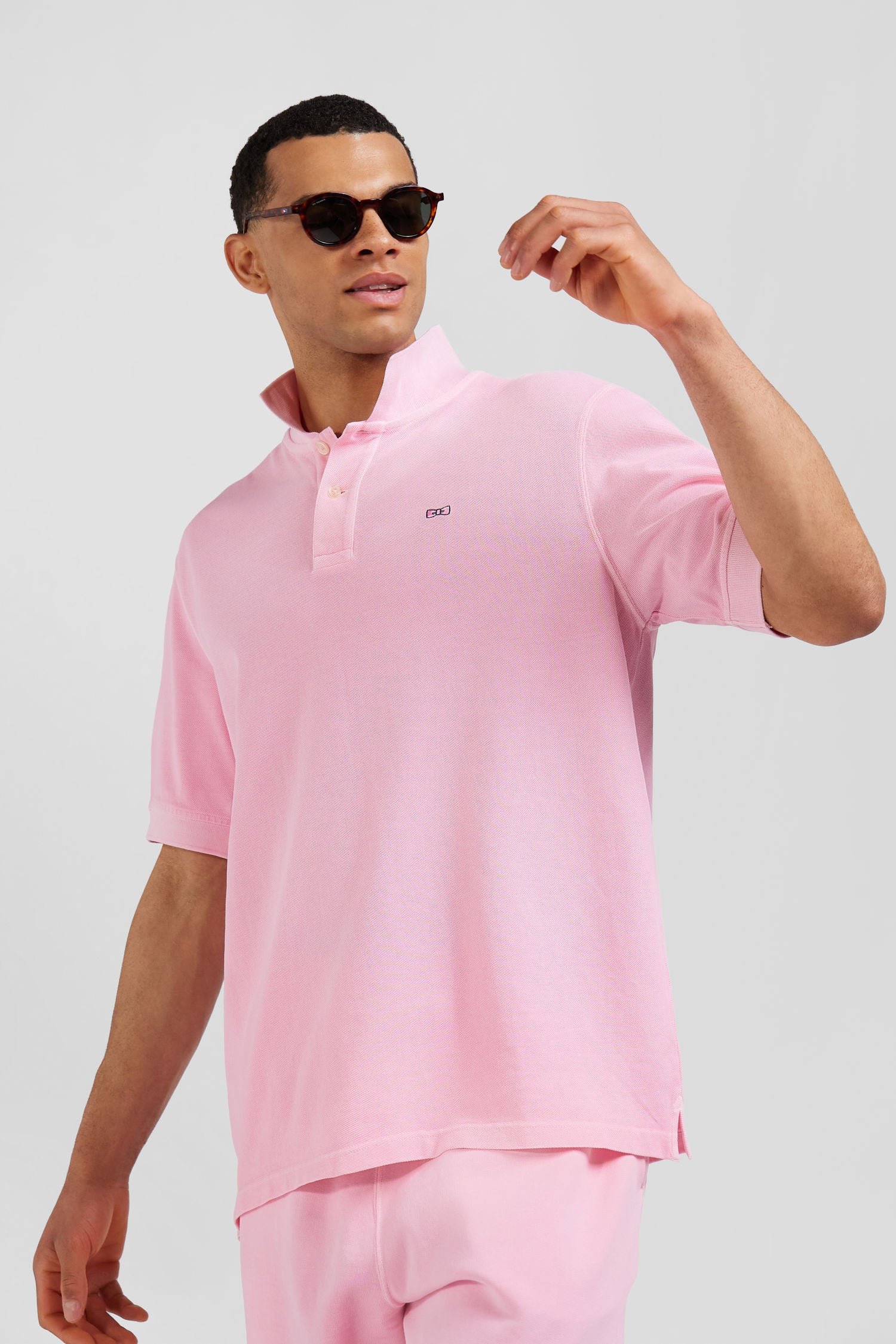 Oversized pink unisex short-sleeved cotton piqué polo shirt