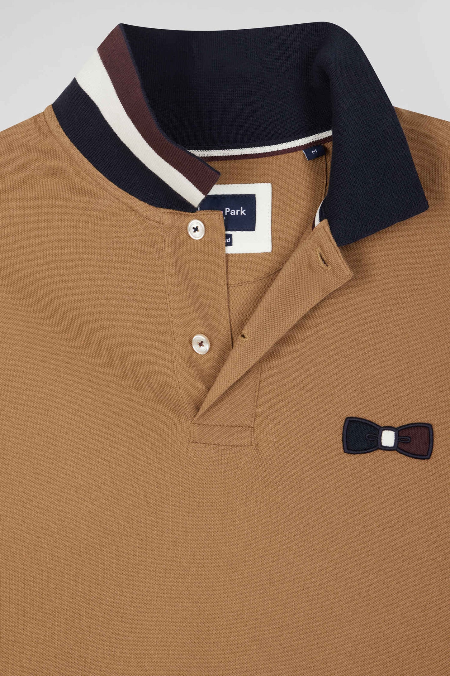 Oversize navy blue short-sleeved cotton piqué polo shirt with tricolor details