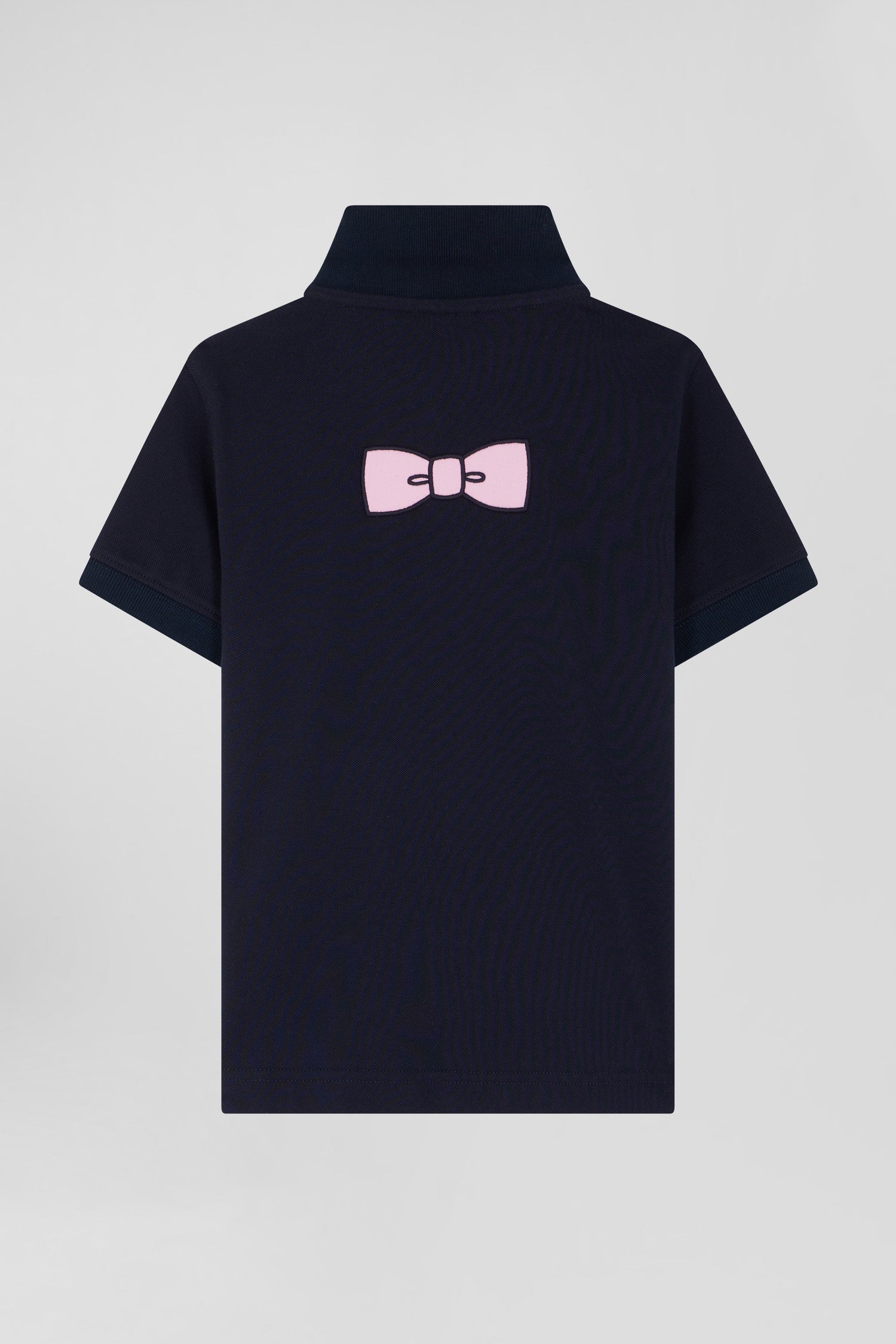 Regular navy blue short-sleeved cotton piqué polo shirt with back bow tie embroidery