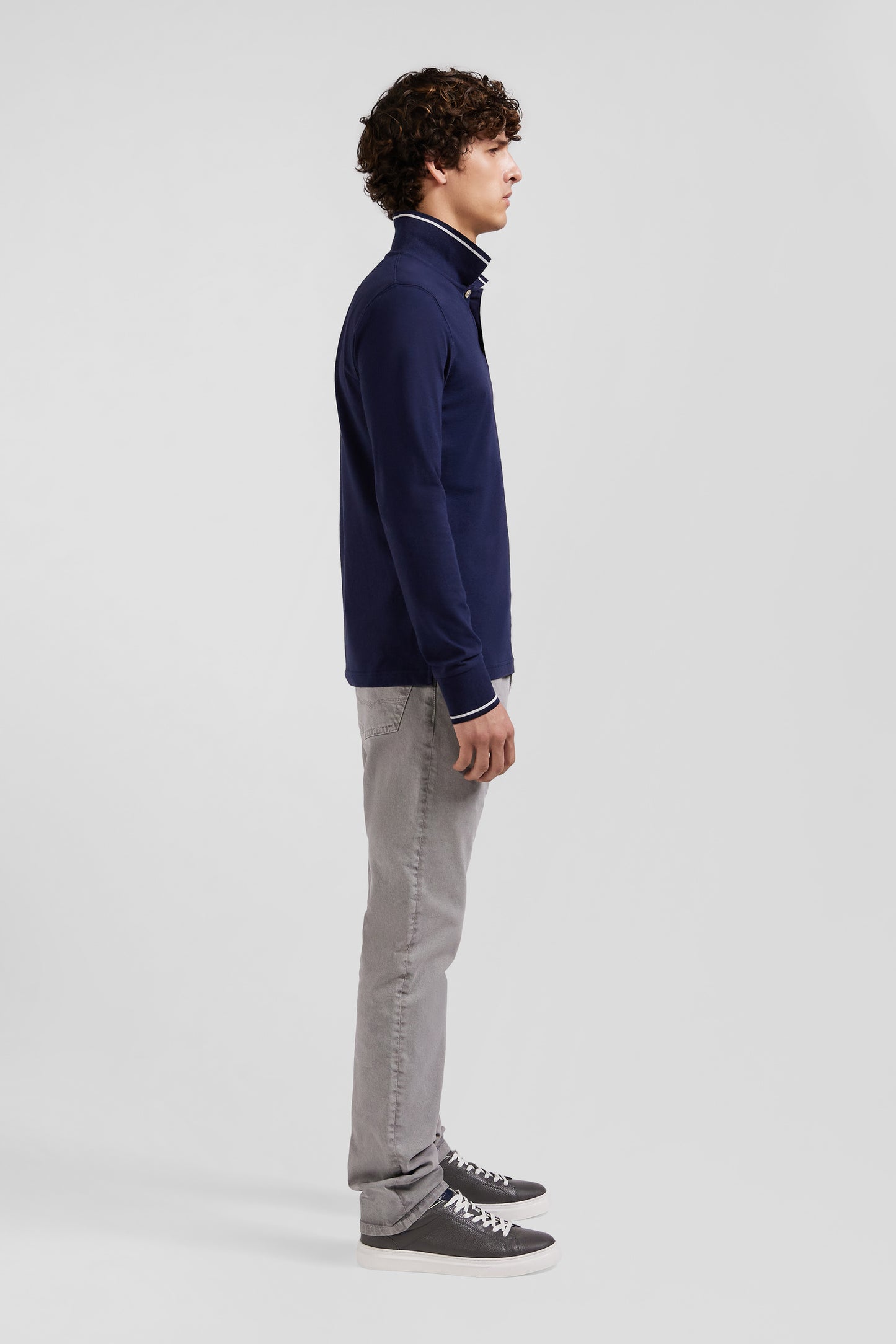 Slim navy blue long-sleeved stretch cotton polo shirt with striped finishes