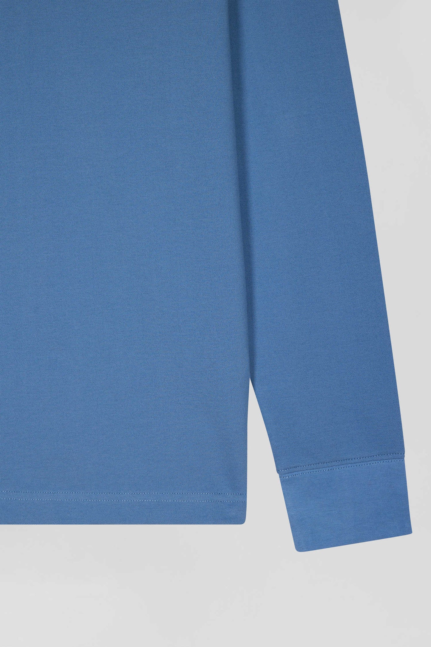 Polo manches longues en piqué coton bleu coupe Slim