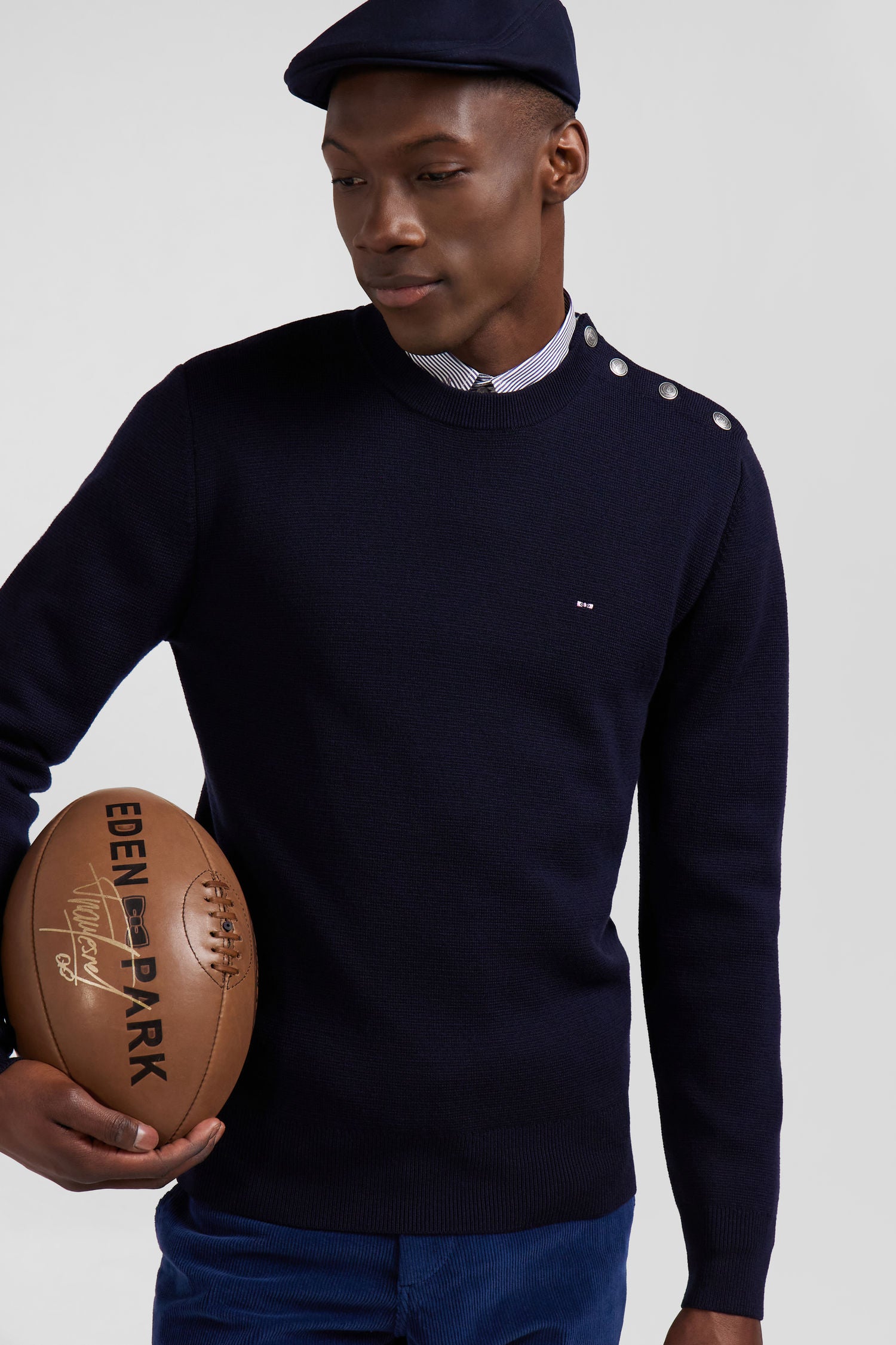 Regular navy blue crew neck jumper with shoulder buttons