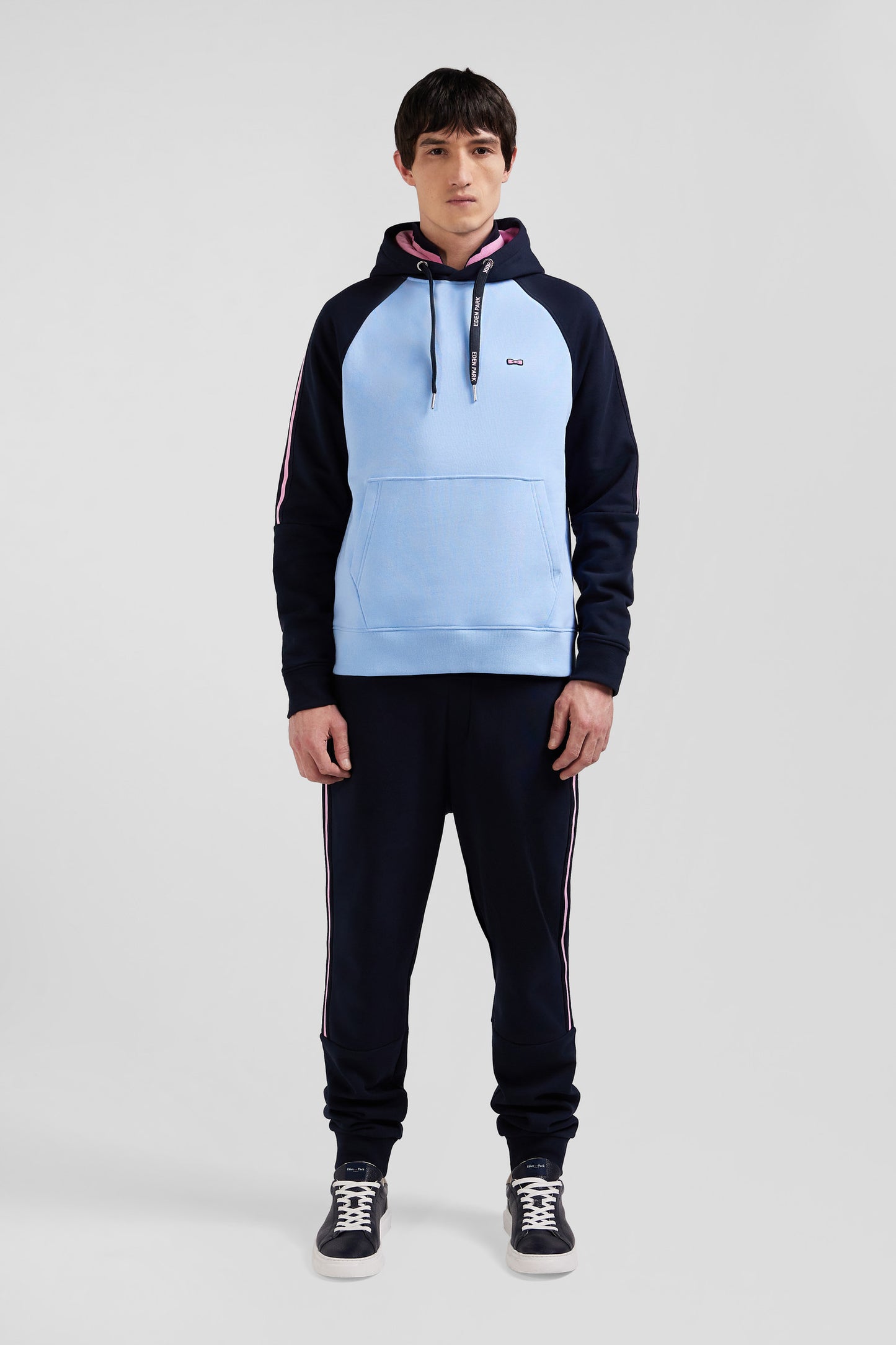 Relaxed navy and sky blue fleece hoodie with branded drawstrings