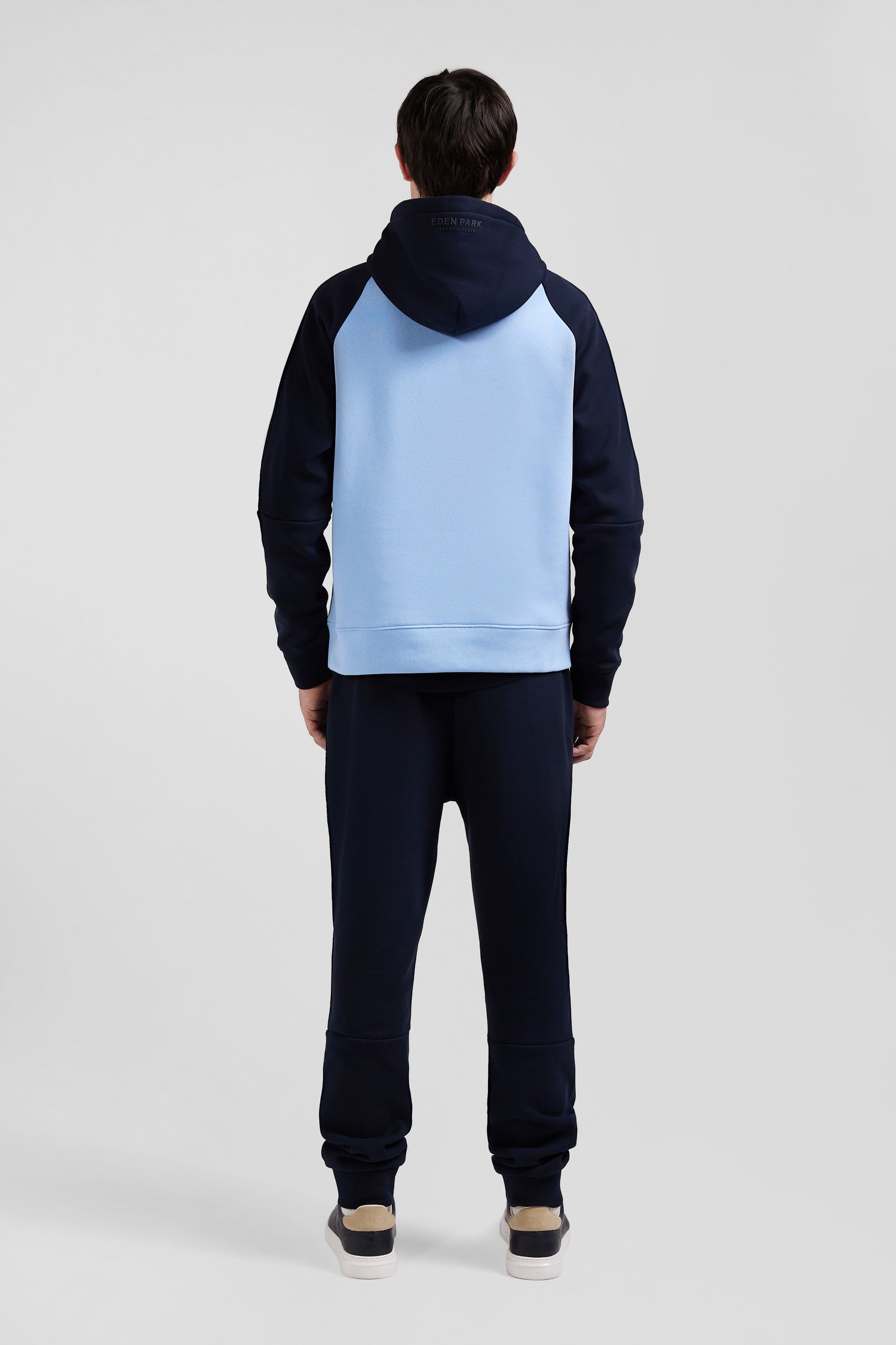 Relaxed navy and sky blue fleece hoodie with branded drawstrings