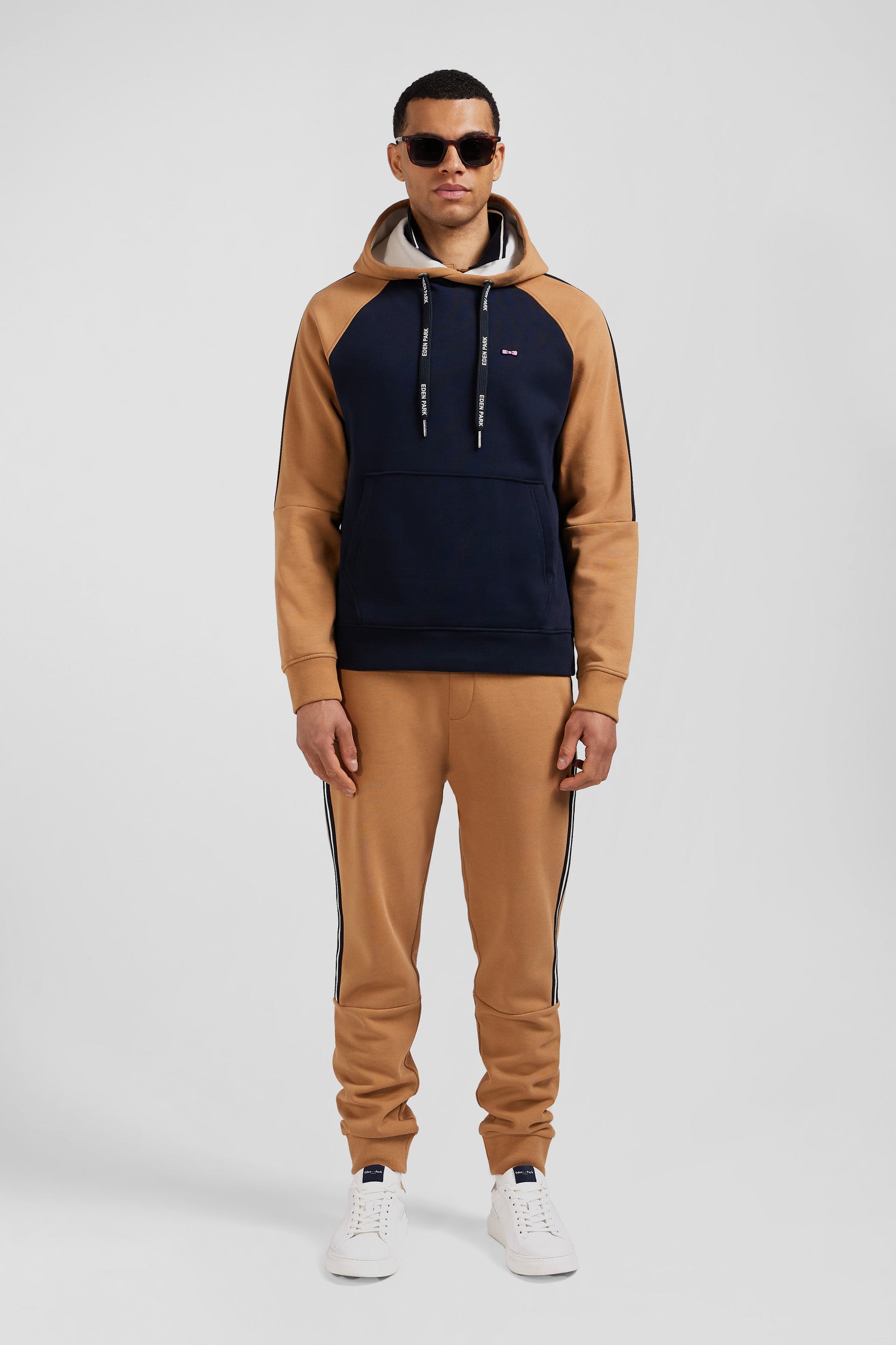 Relaxed navy blue and camel fleece hoodie with branded drawstrings