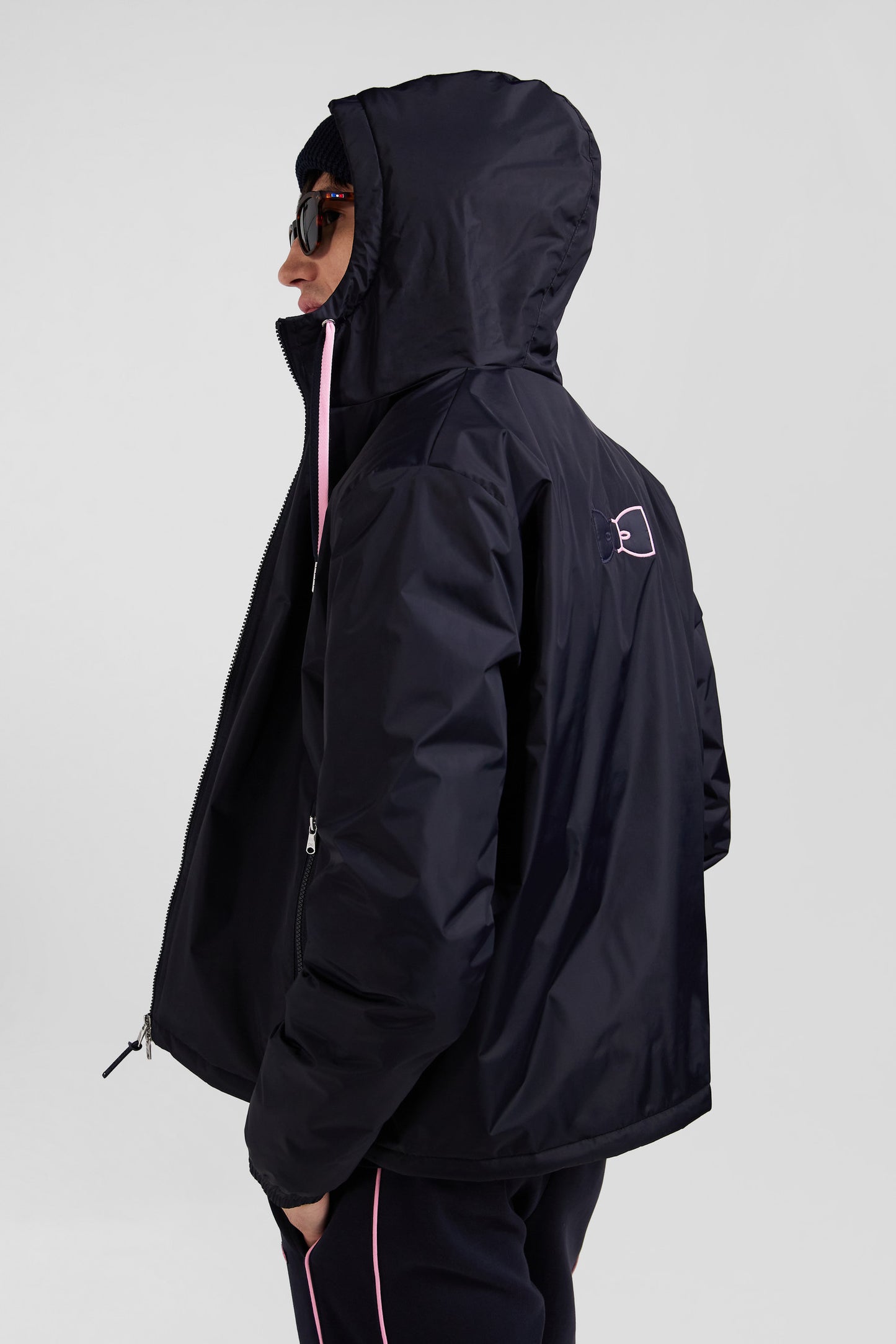 Navy blue hooded windbreaker jacket