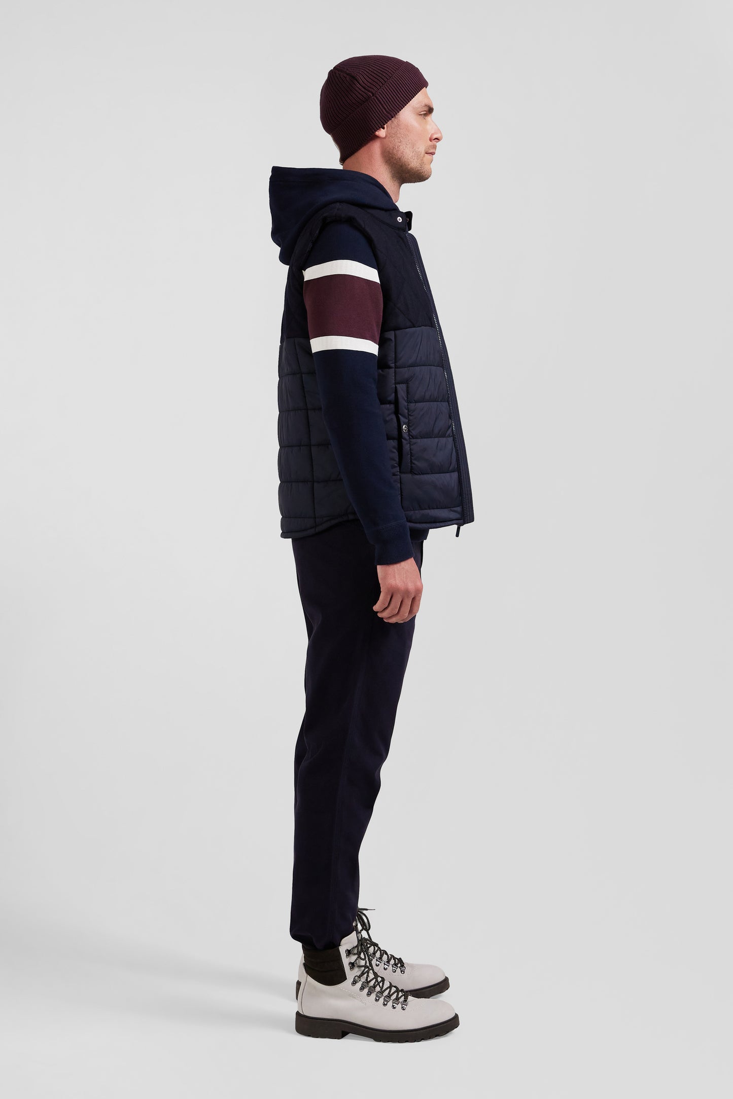 Navy blue sleeveless double quilted high collar down vest