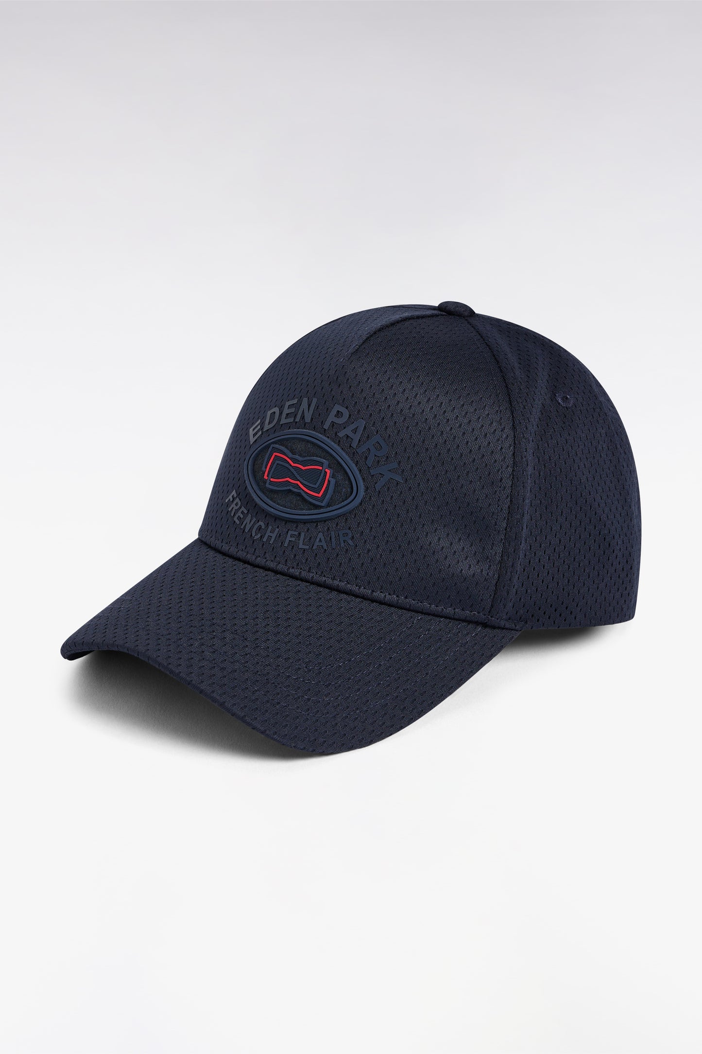 Navy mesh cap with embossed pattern