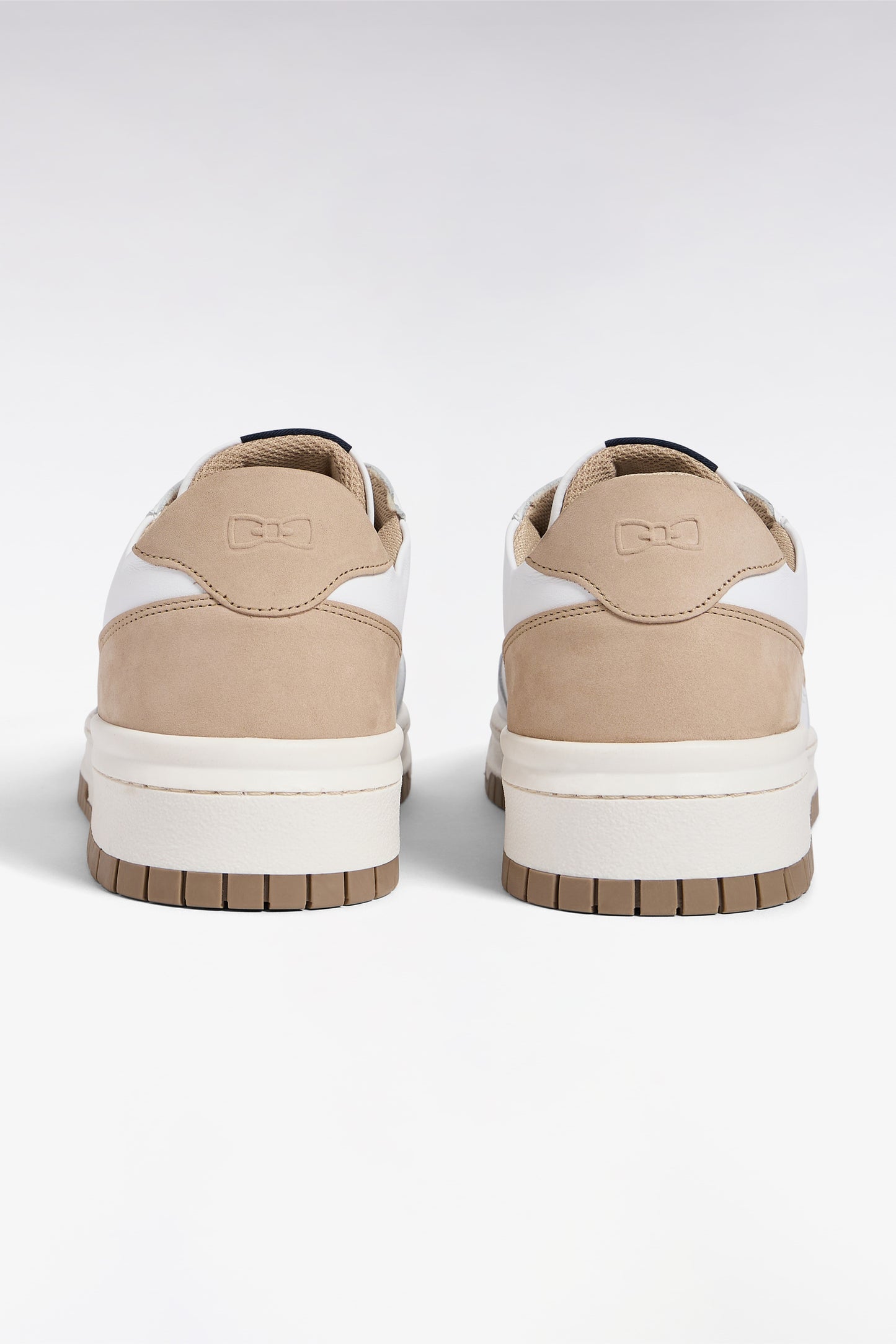 Two-tone leather and suede sneakers in beige and white