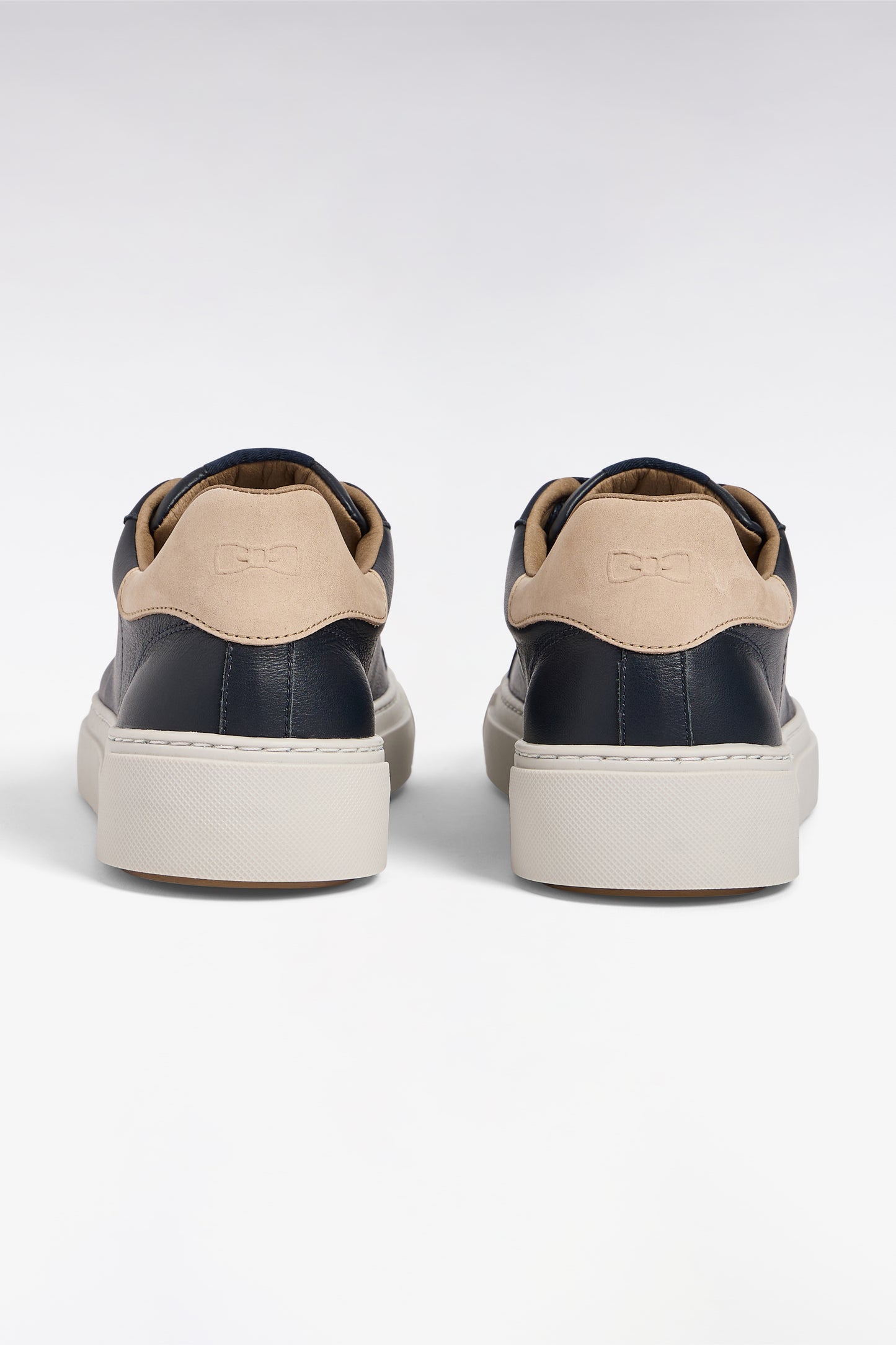 Two-tone low-top sneakers in navy leather and sand suede