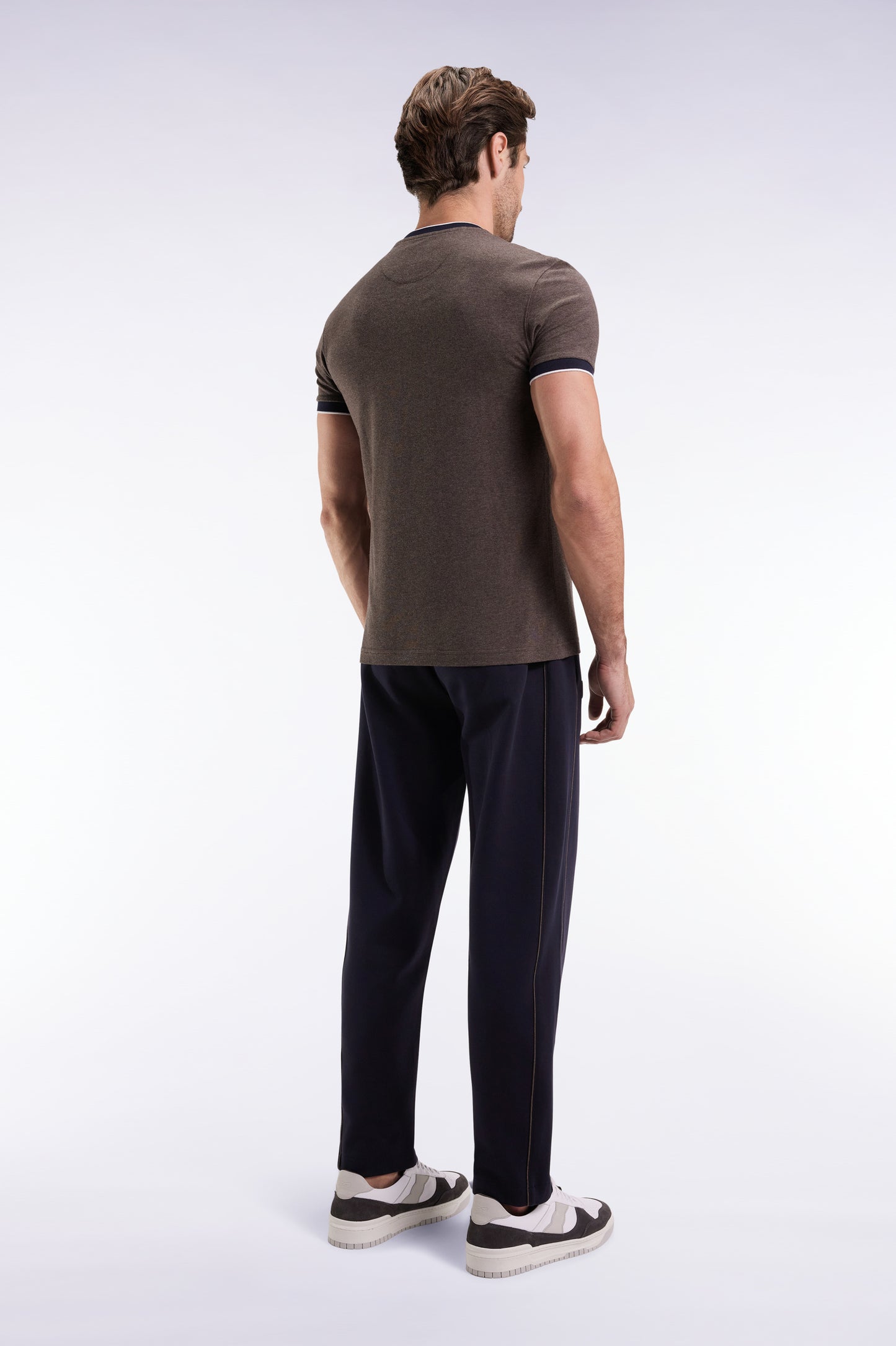 Navy brushed fleece jogging suit with piping and front pleats, straight cut