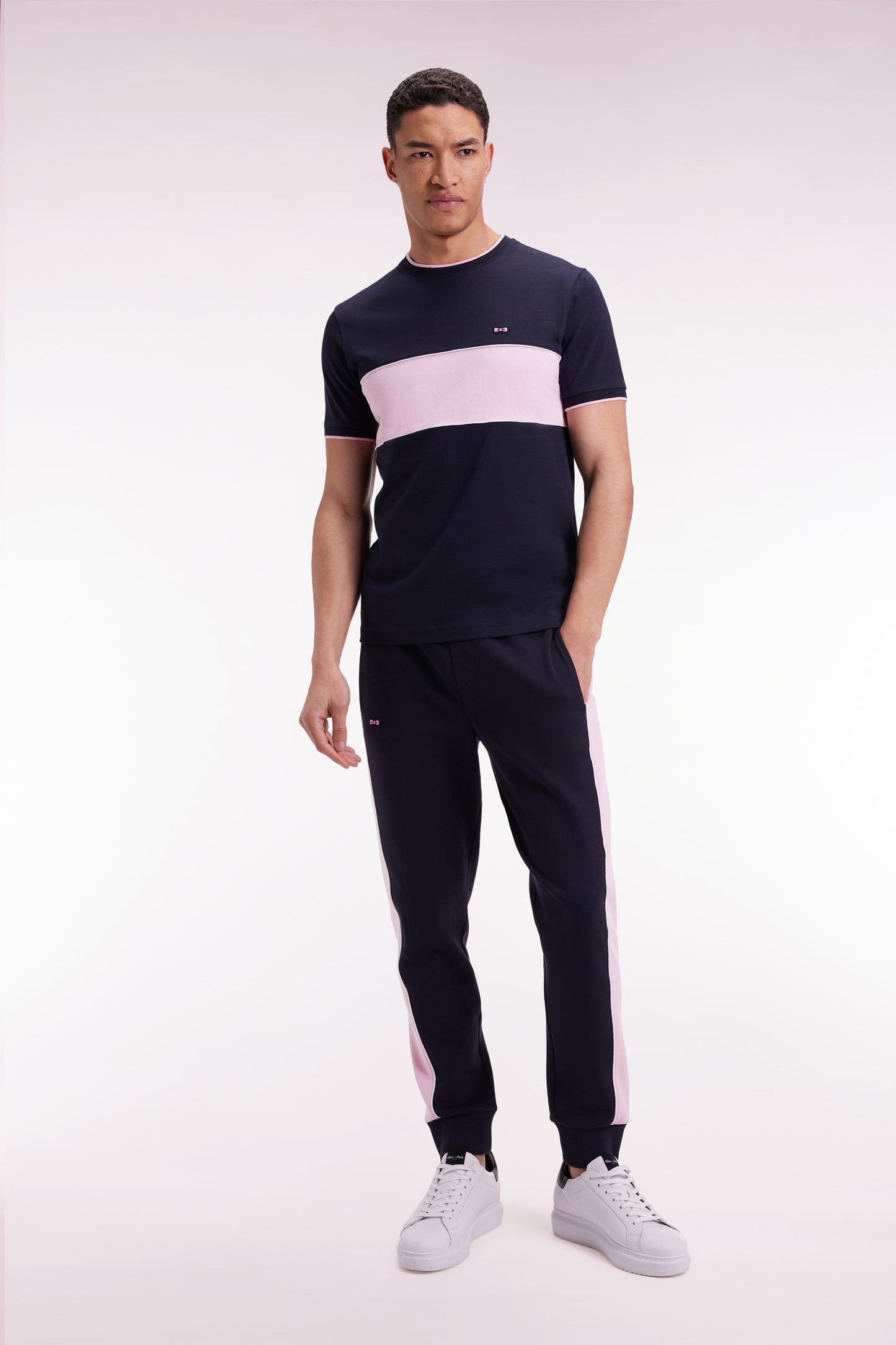 Navy brushed fleece jogging suit with pink stripes, straight cut