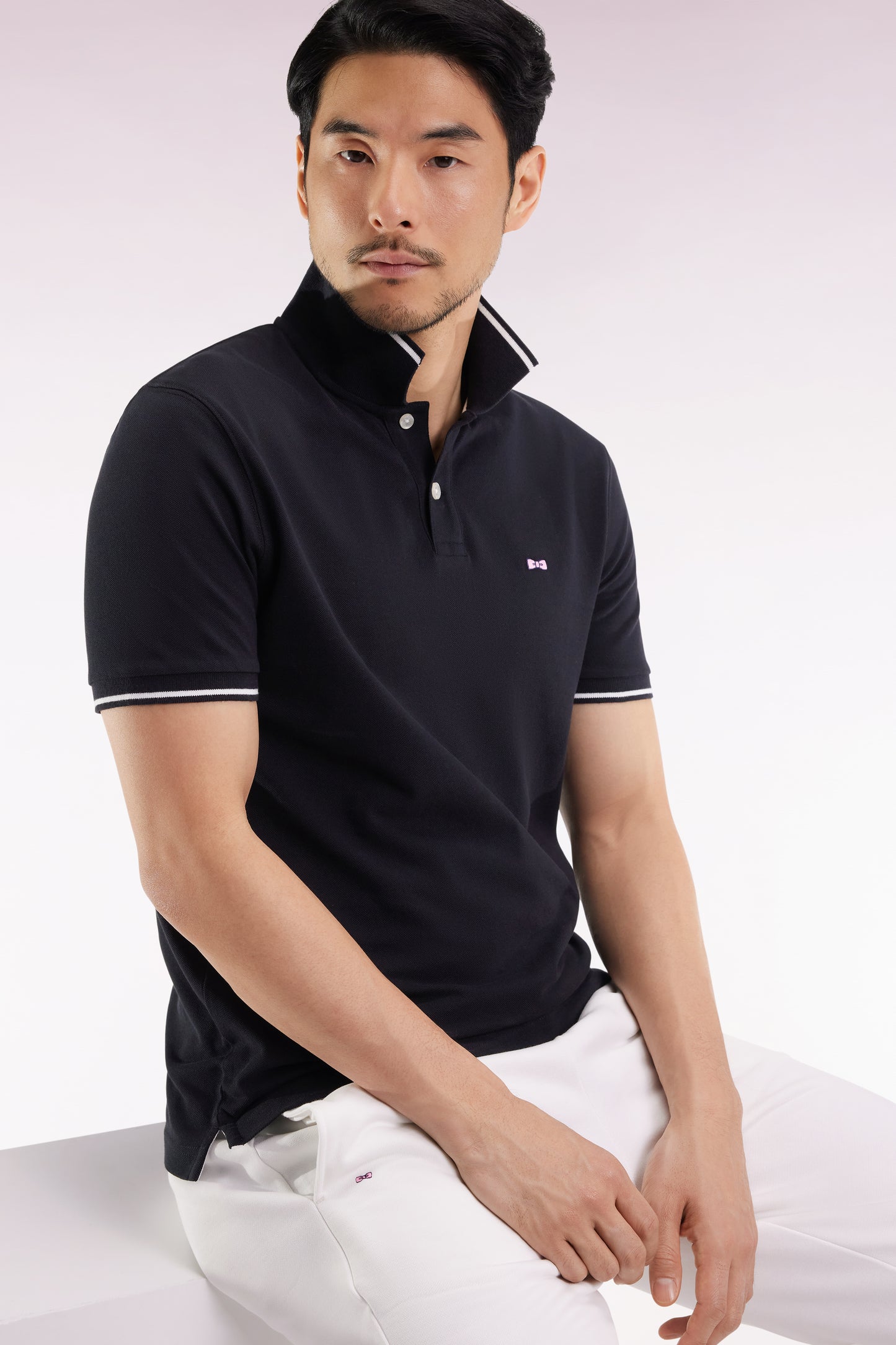 Black short-sleeved polo shirt