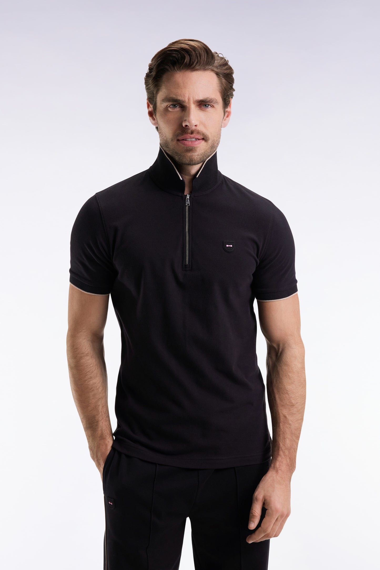Short-sleeved polo shirt in black stretch cotton piqué with zip and slim fit