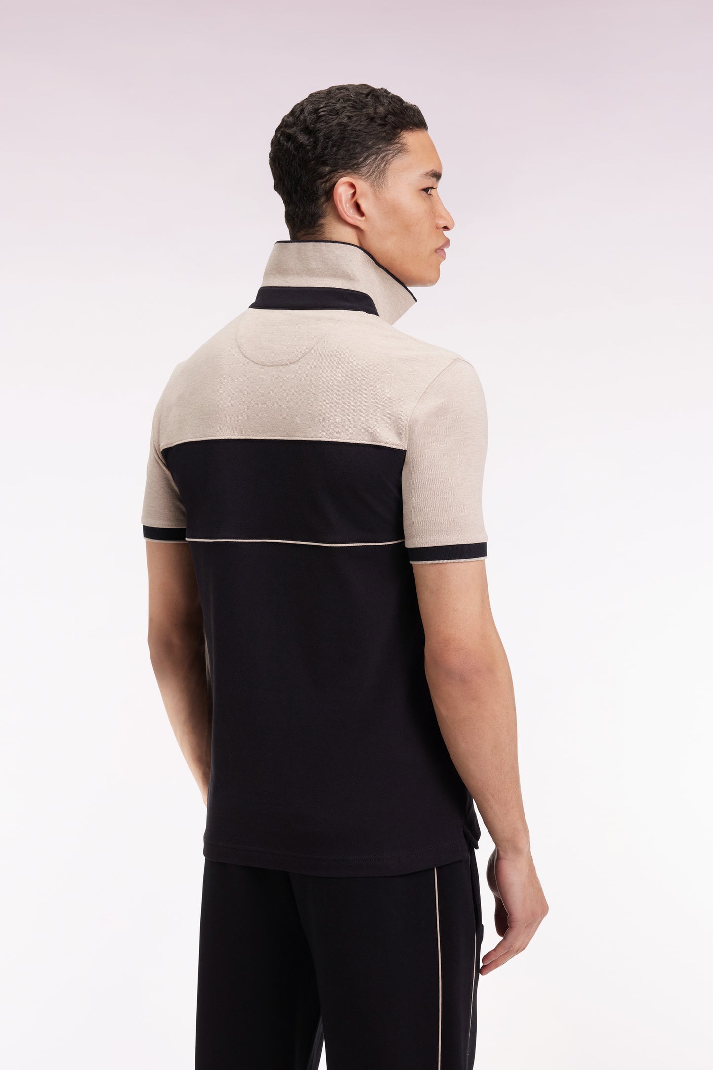 Two-tone short-sleeved polo shirt in black stretch cotton piqué, slim fit