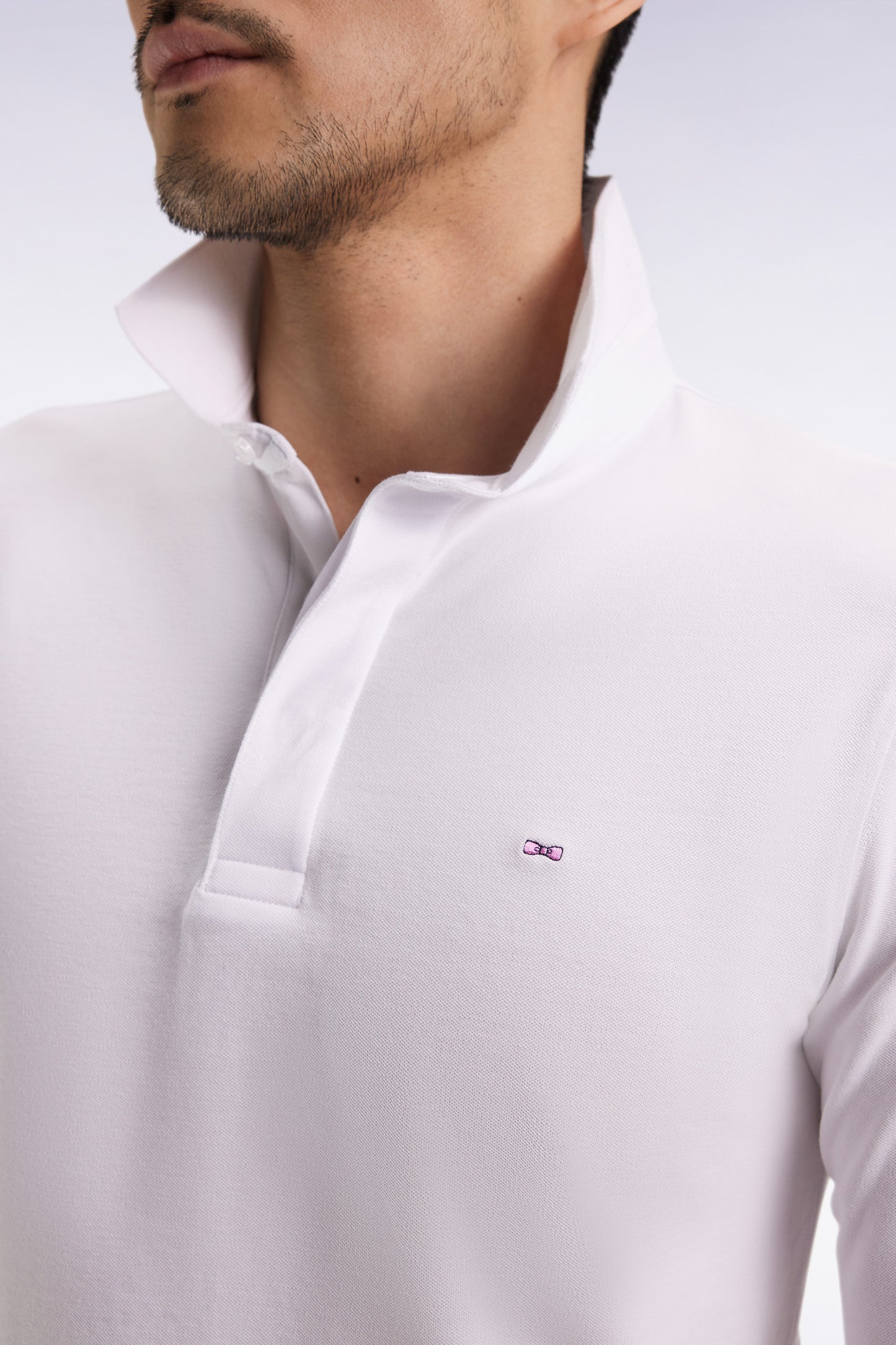 Polo à manches longues en coton stretch blanc coupe slim