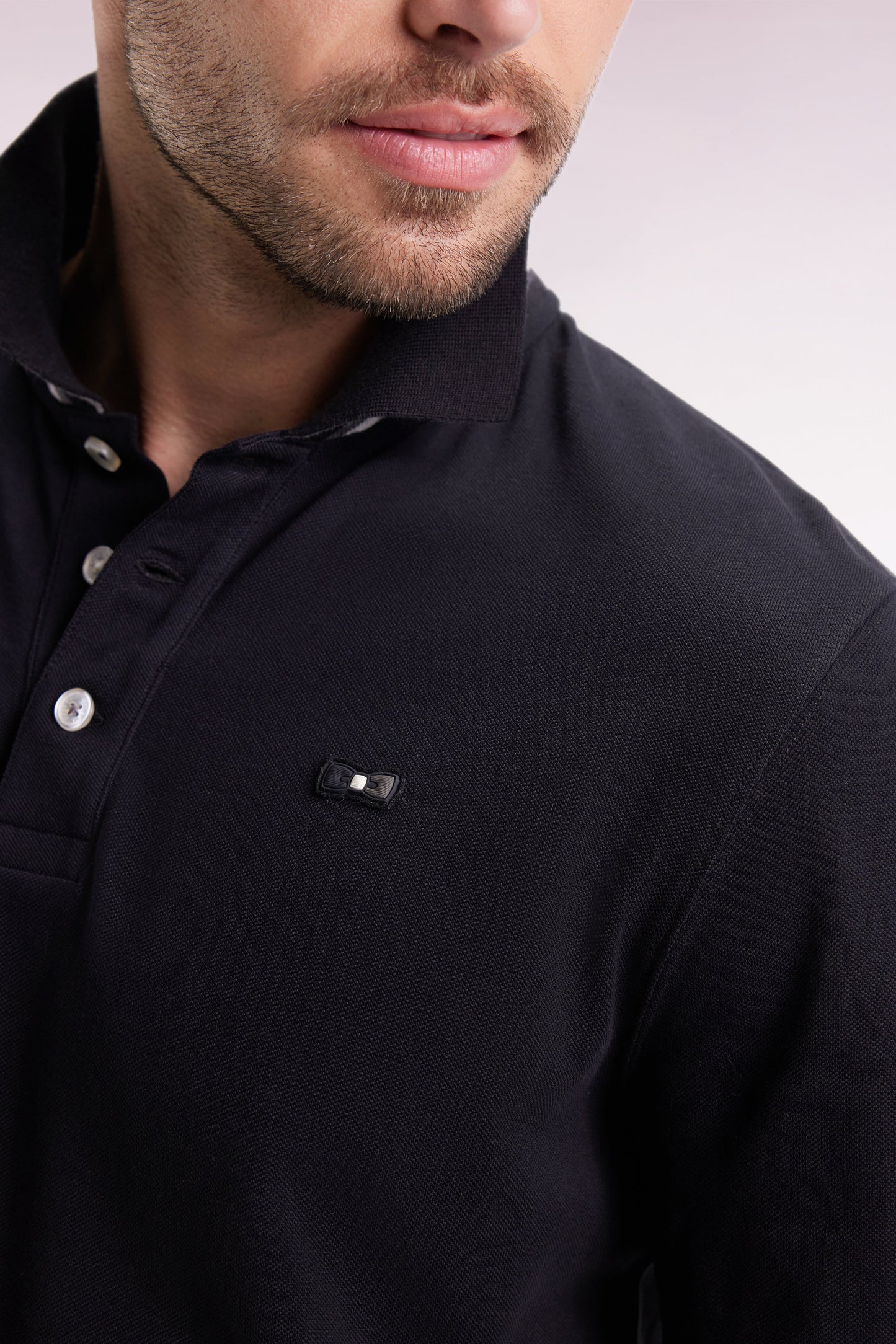 Relaxed fit long-sleeved polo shirt in black cotton