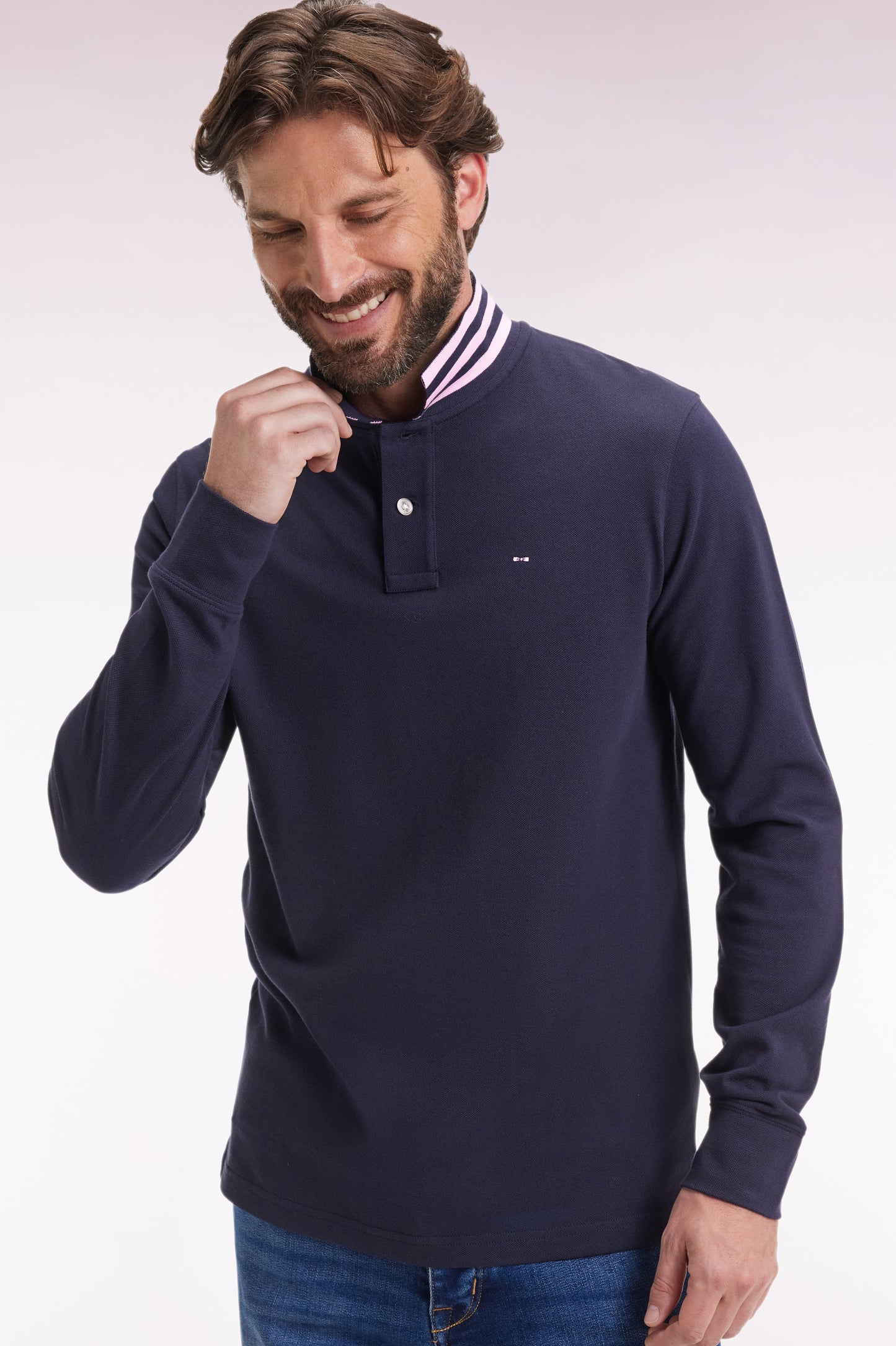 Long-sleeved polo shirt in navy cotton piqué with striped collar.