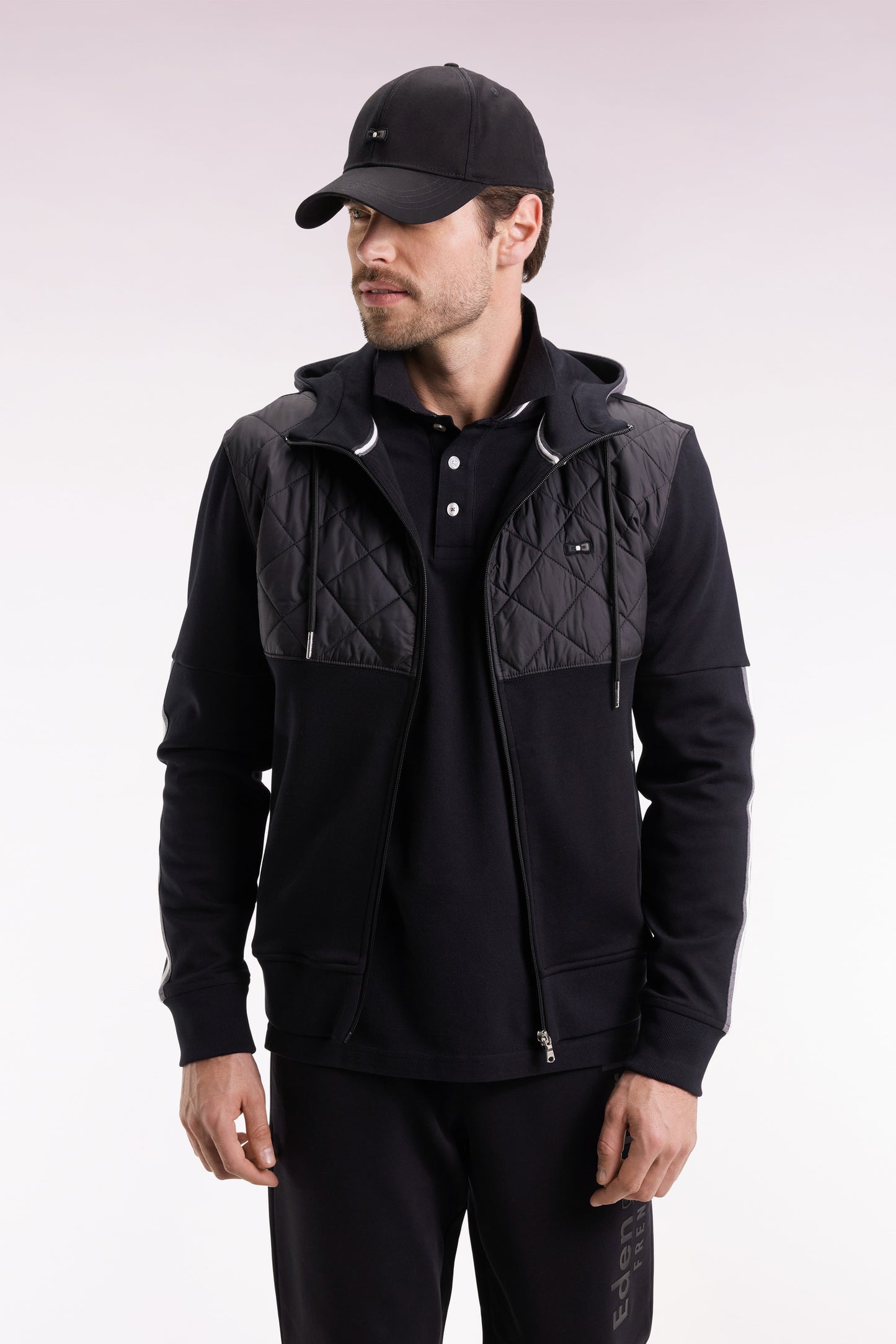 Zipped sweatshirt in black and grey quilted bimaterial interlock