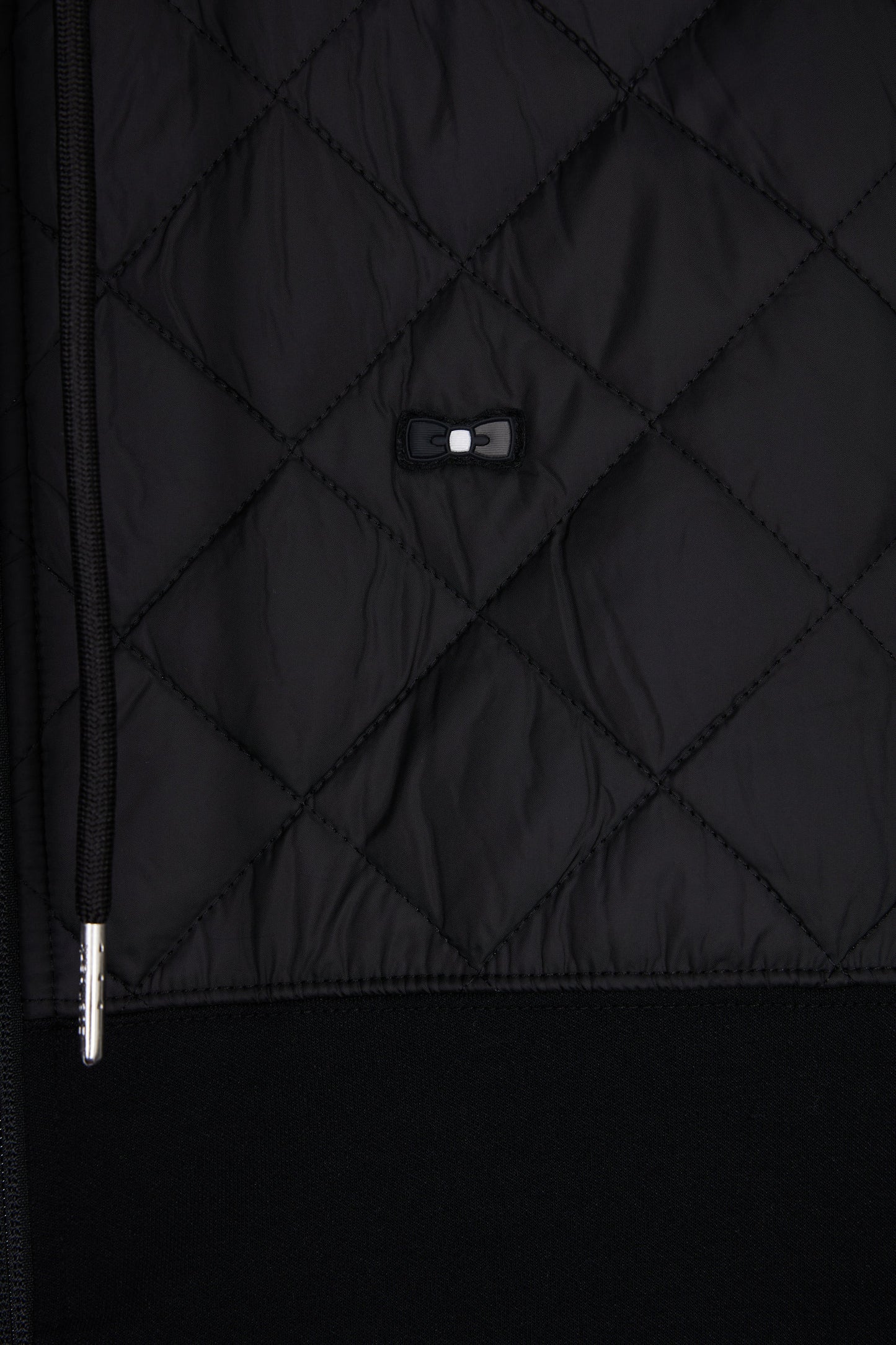 Zipped sweatshirt in black and grey quilted bimaterial interlock