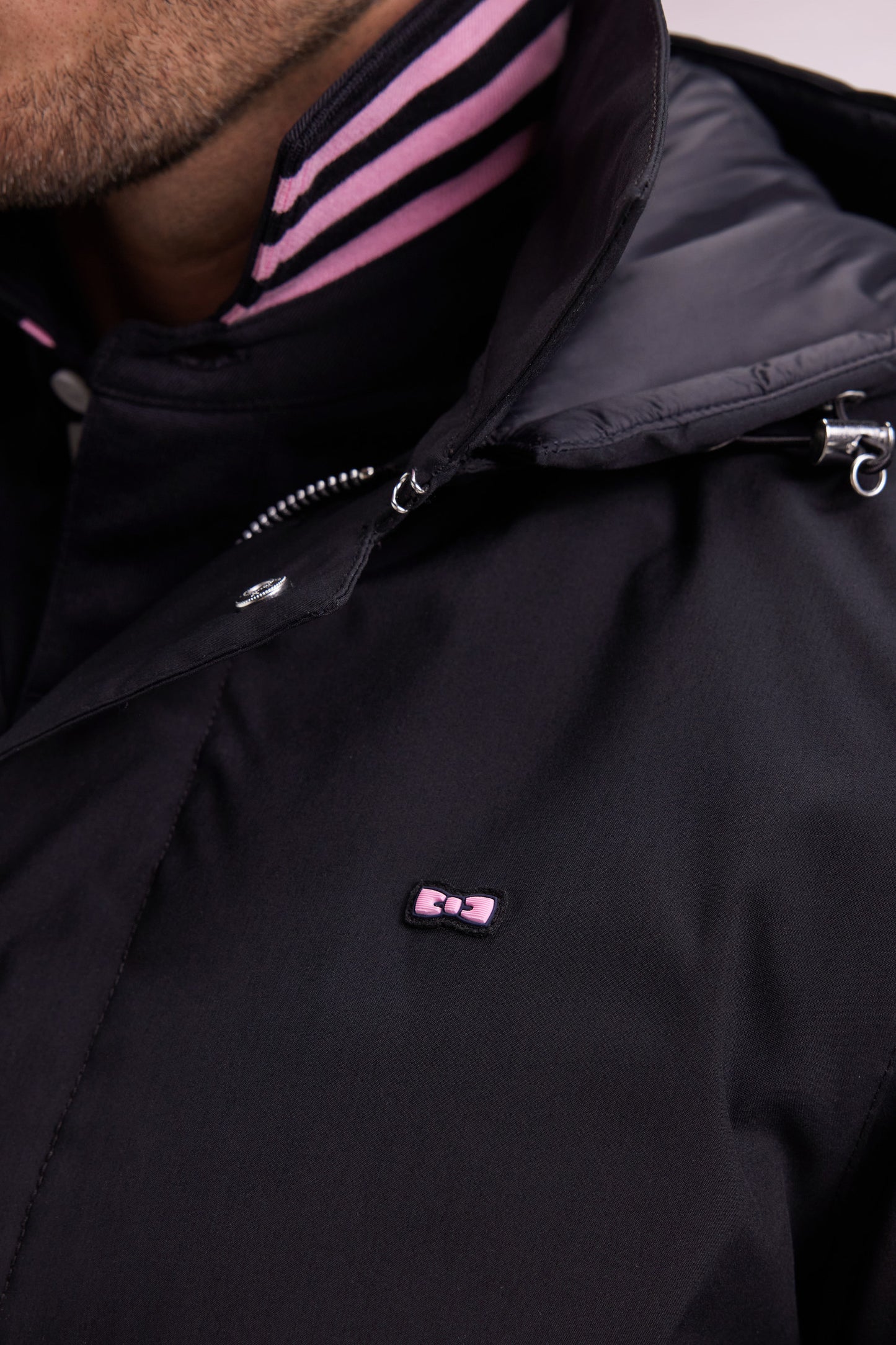 Long black nylon raincoat with removable hood
