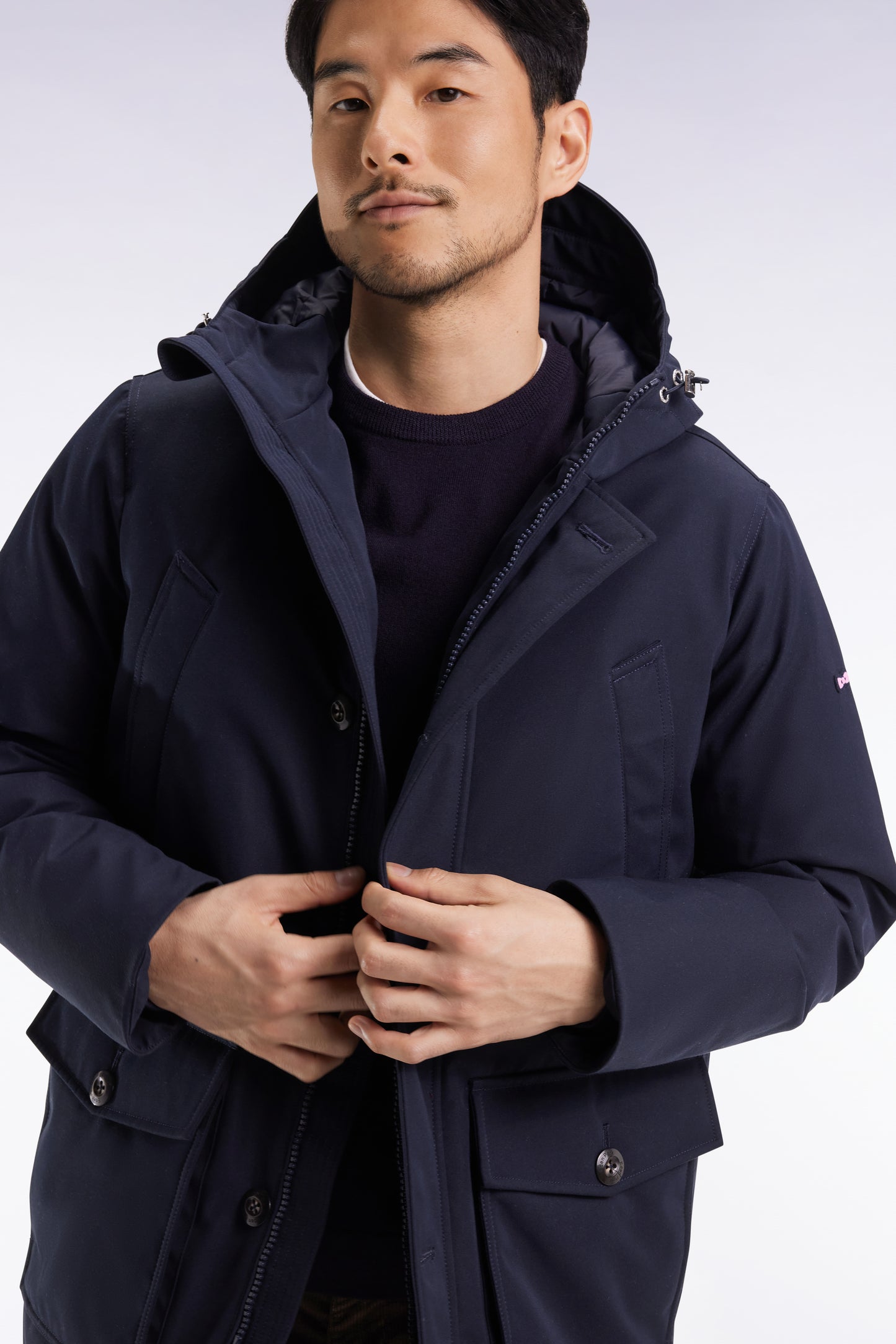 Short parka in navy nylon with patch pockets