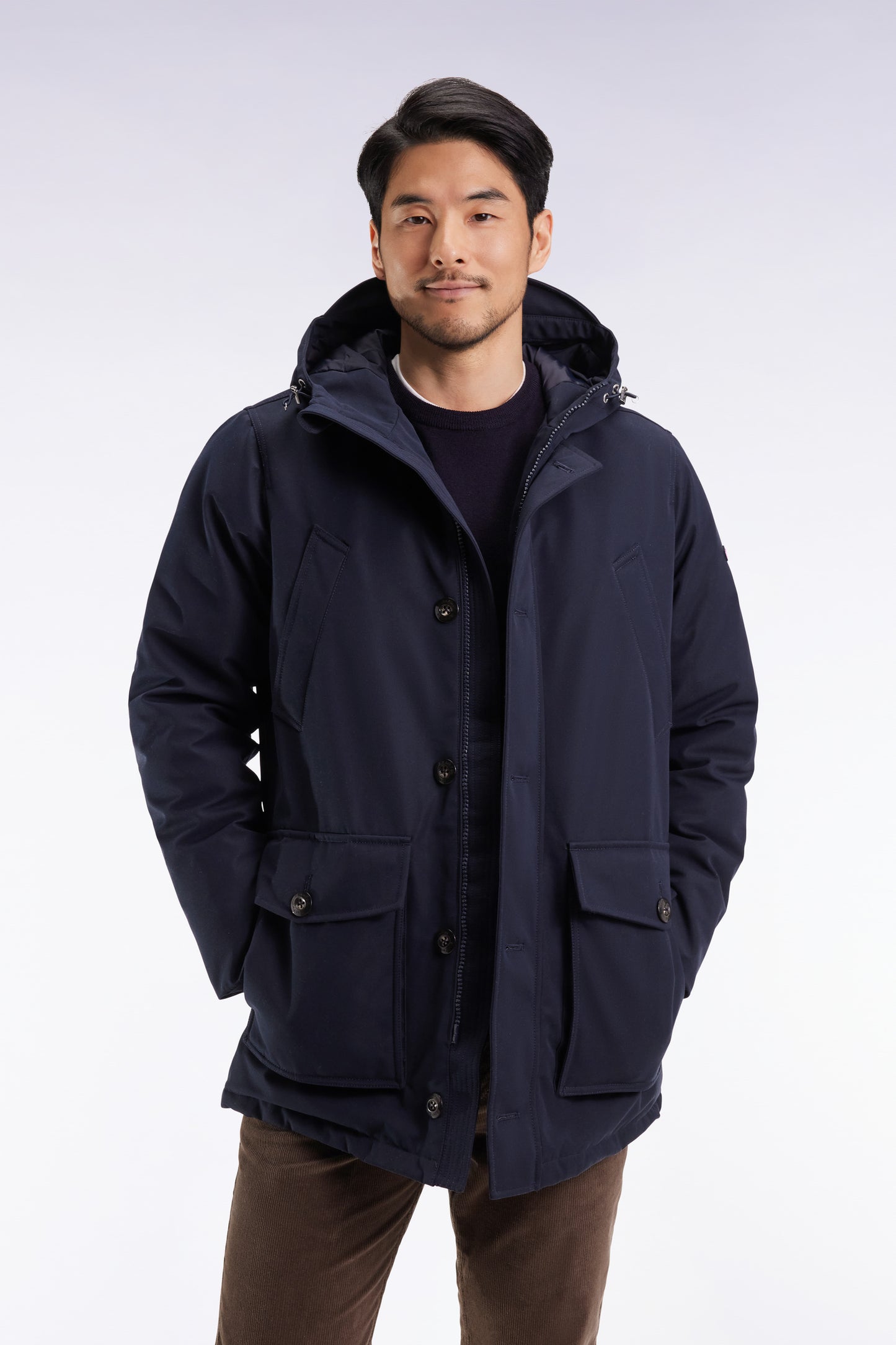 Short parka in navy nylon with patch pockets
