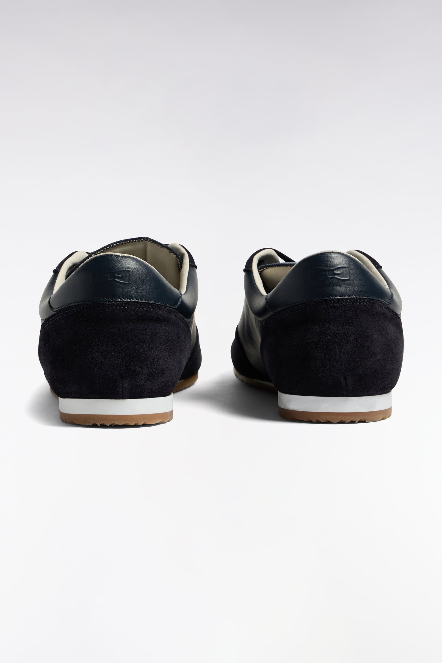 Baskets basses bimatière en cuir et daim marine