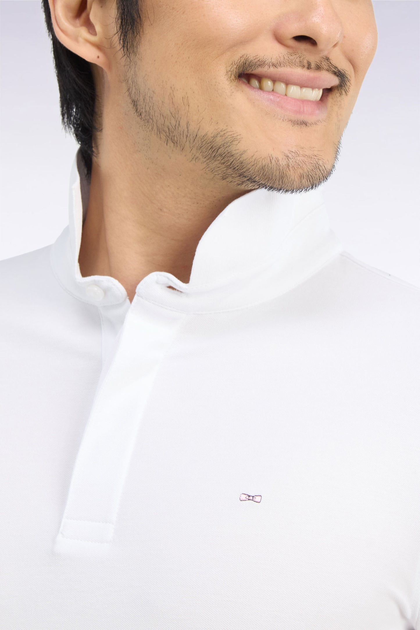 Polo manches courtes en coton stretch blanc coupe ajustée