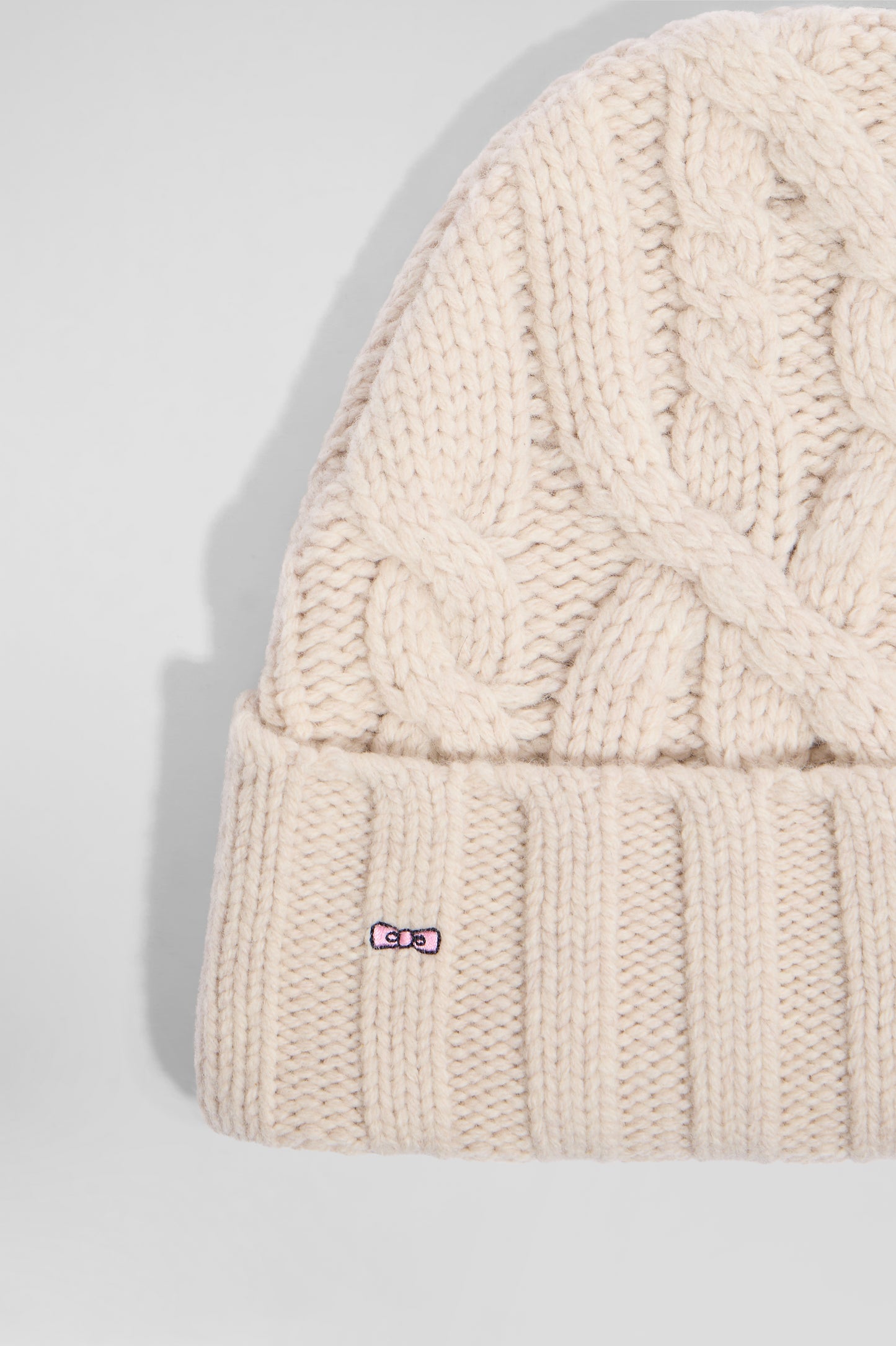 Ecru cable knitted wool beanie